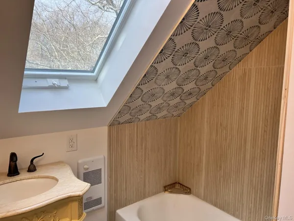 a bathroom with a sink and a toilet