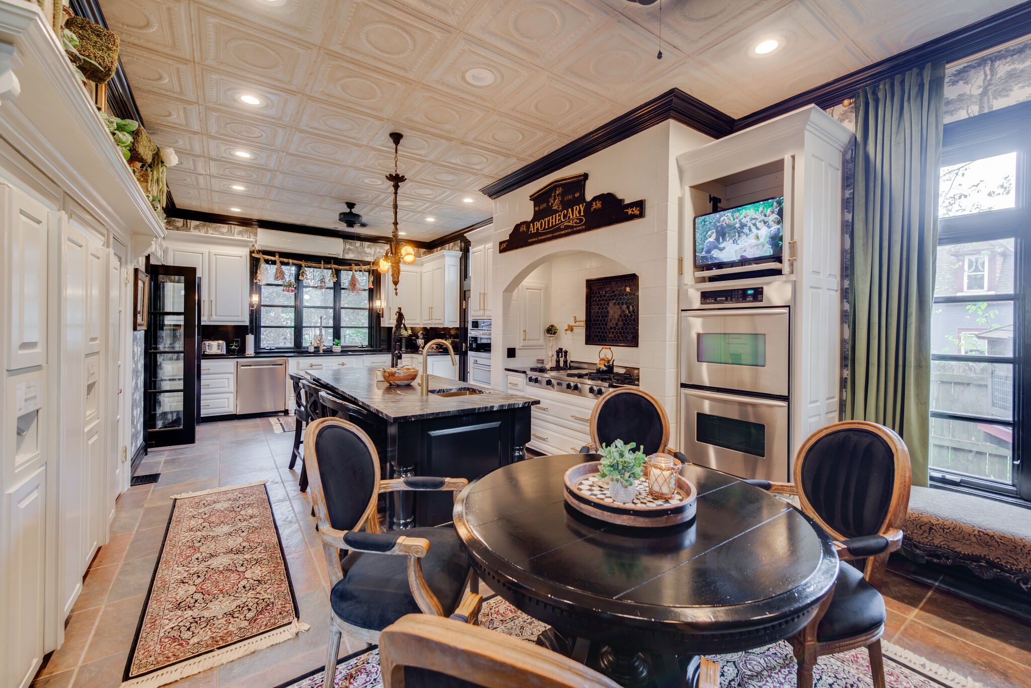 607 5th Avenue West Springfield, TN 37172 - Photo 24 of 50 a view of a dining room with furniture a rug and wooden floor