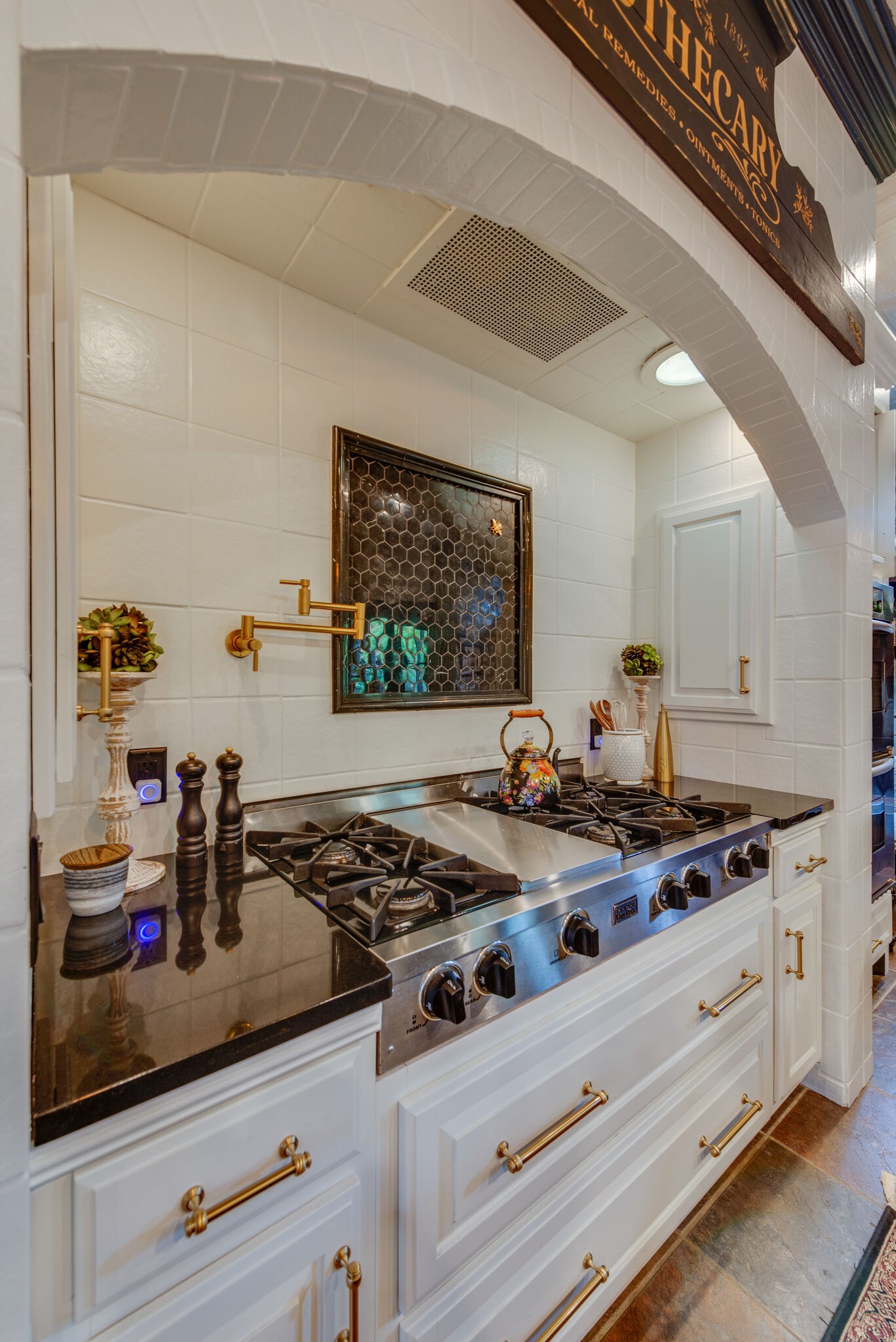 607 5th Avenue West Springfield, TN 37172 - Photo 31 of 50 a kitchen with stainless steel appliances granite countertop a stove and a sink