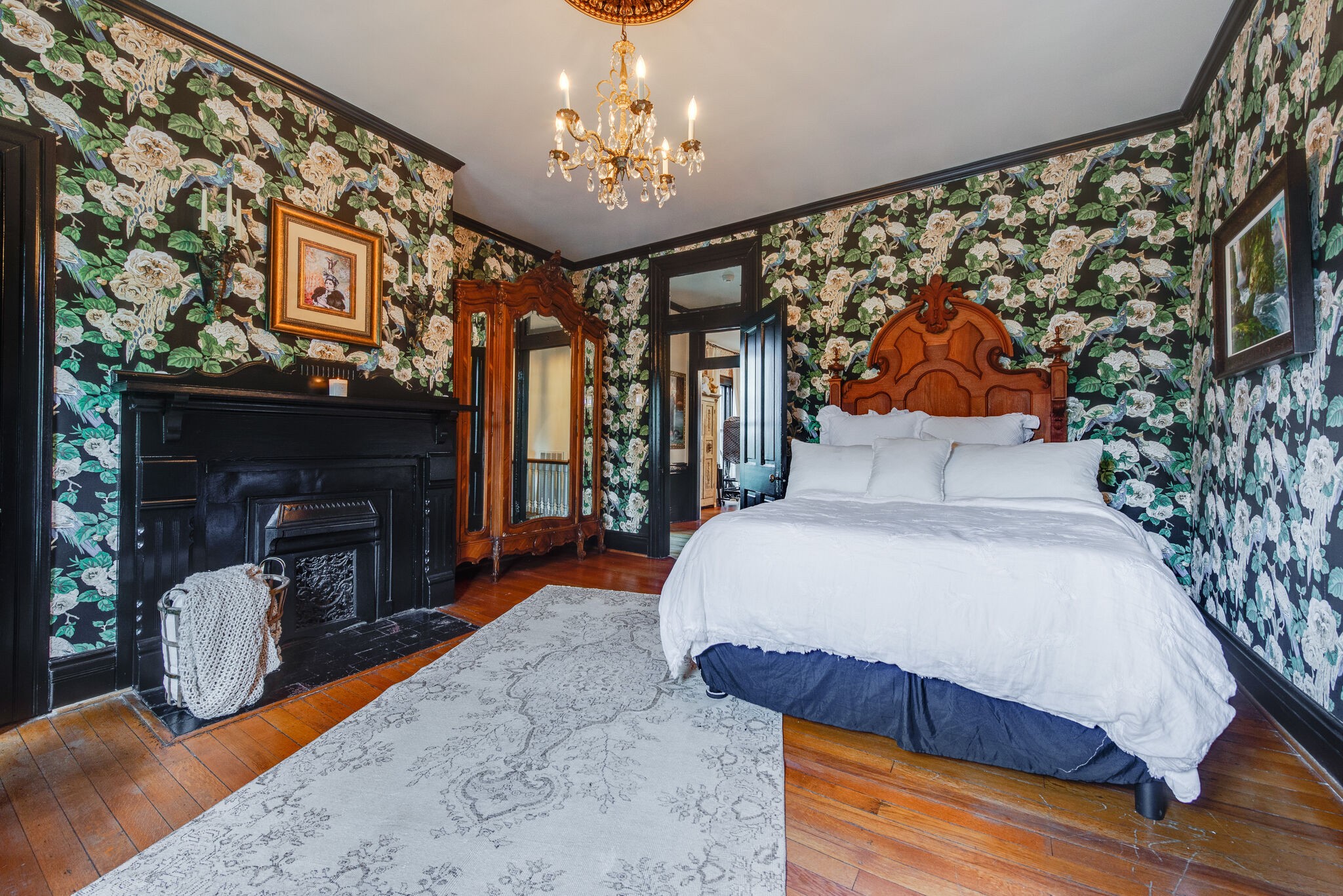 607 5th Avenue West Springfield, TN 37172 - Photo 35 of 50 a spacious bedroom with a bed and a fireplace