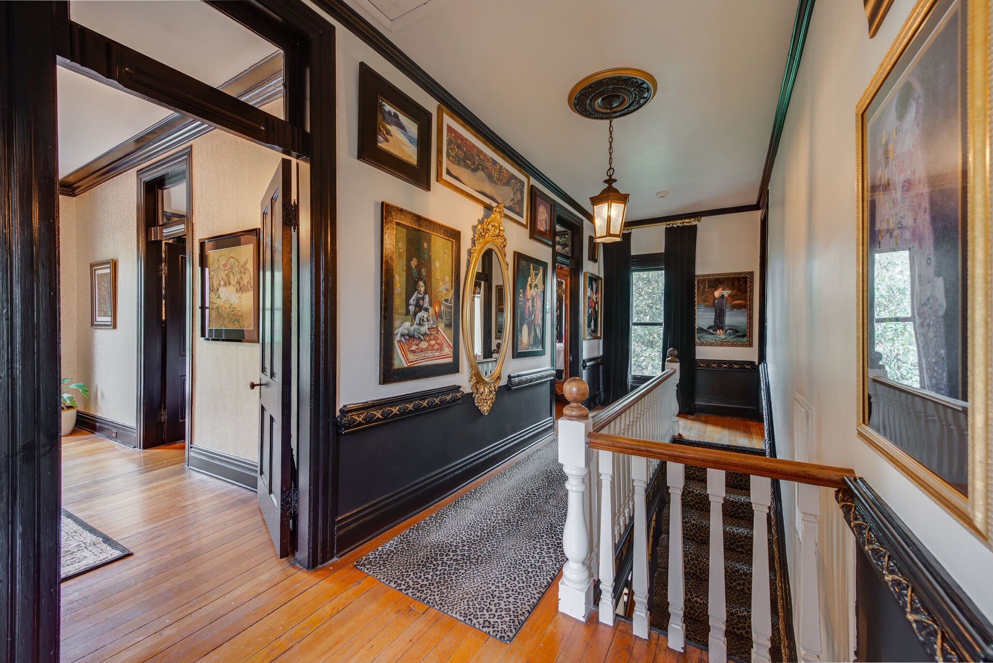 607 5th Avenue West Springfield, TN 37172 - Photo 37 of 50 a view of a hallway with wooden floor and staircase