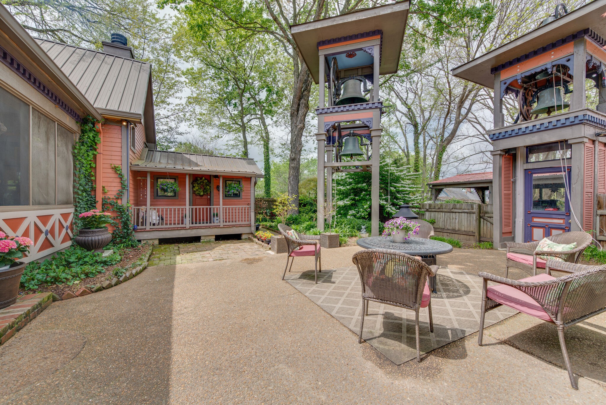 607 5th Avenue West Springfield, TN 37172 - Photo 45 of 50 a view of a patio with a table and chairs and potted plants