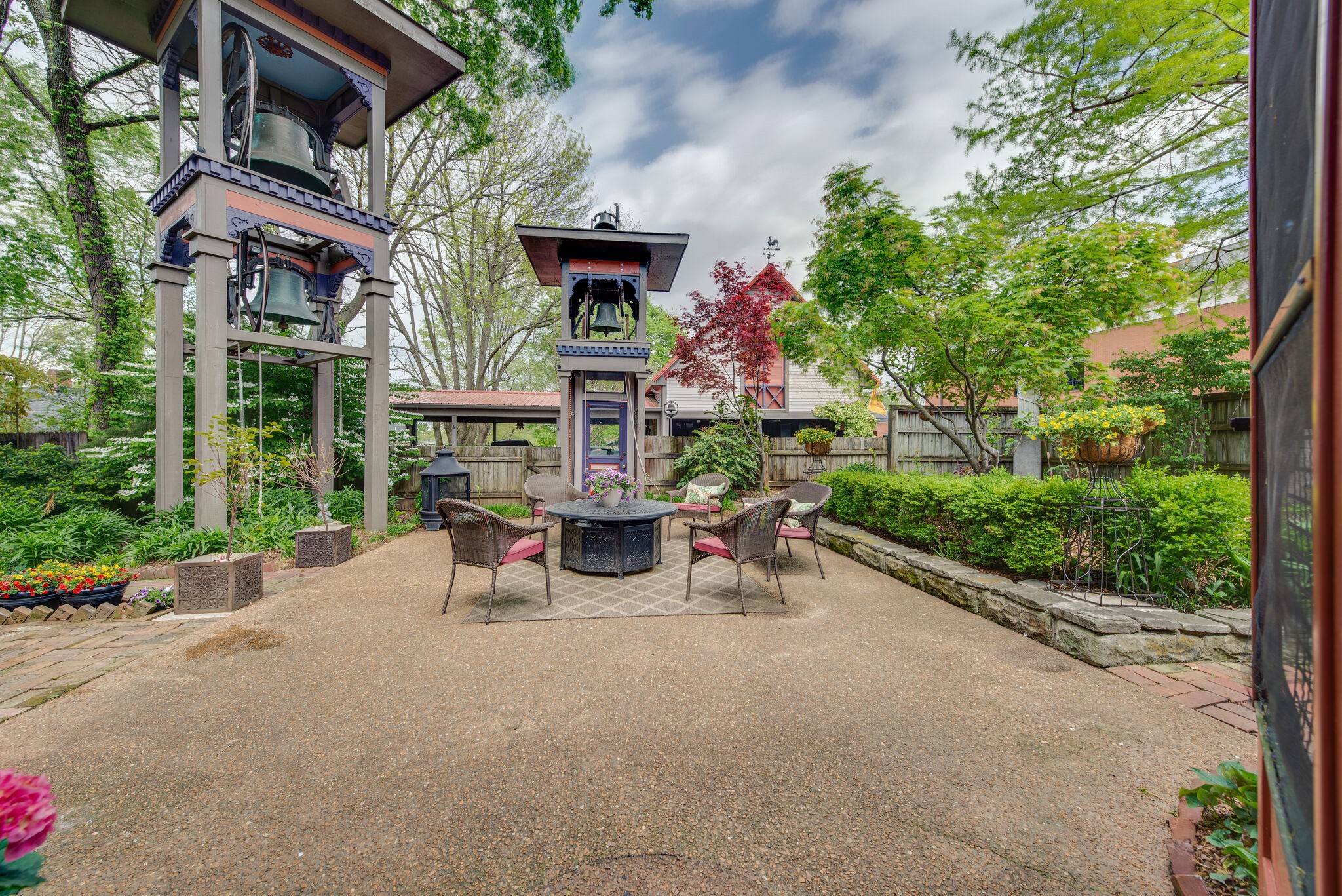 607 5th Avenue West Springfield, TN 37172 - Photo 46 of 50 a view of a patio with a table and chairs under an umbrella