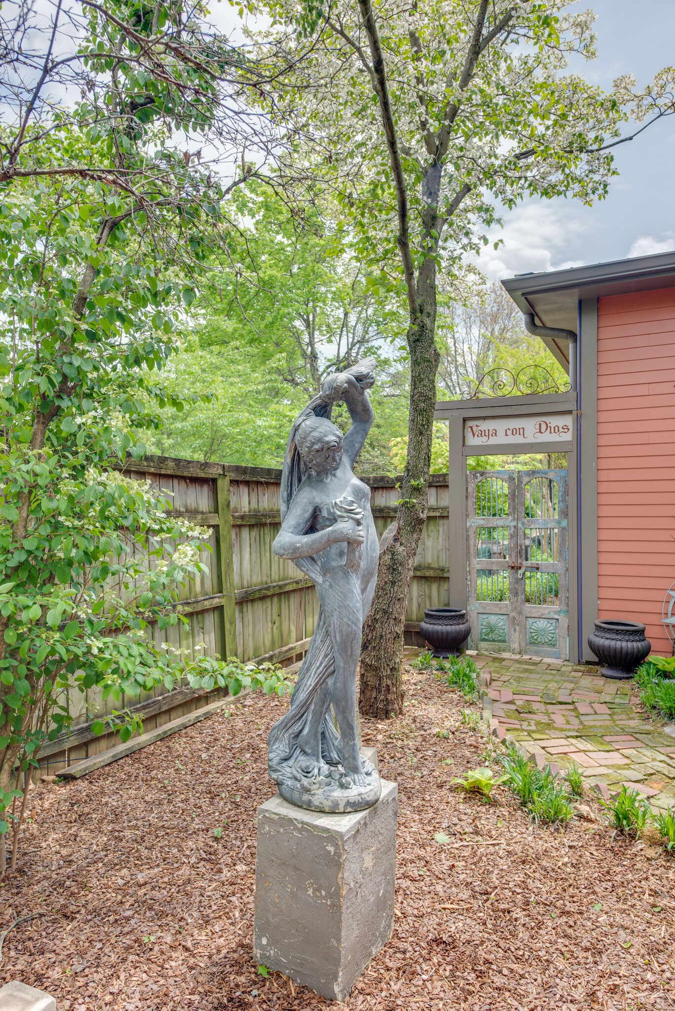 607 5th Avenue West Springfield, TN 37172 - Photo 48 of 50 a view of a garden with a fountain