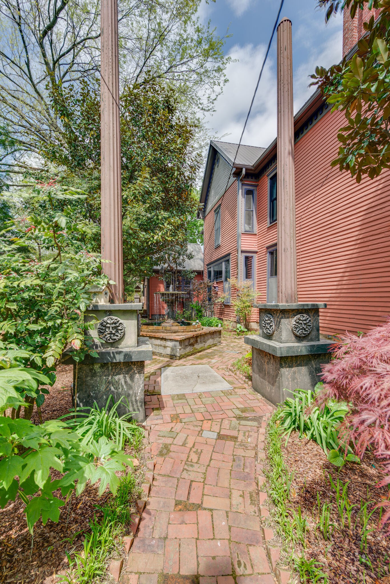 607 5th Avenue West Springfield, TN 37172 - Photo 49 of 50 a view of a patio with chairs and potted plants