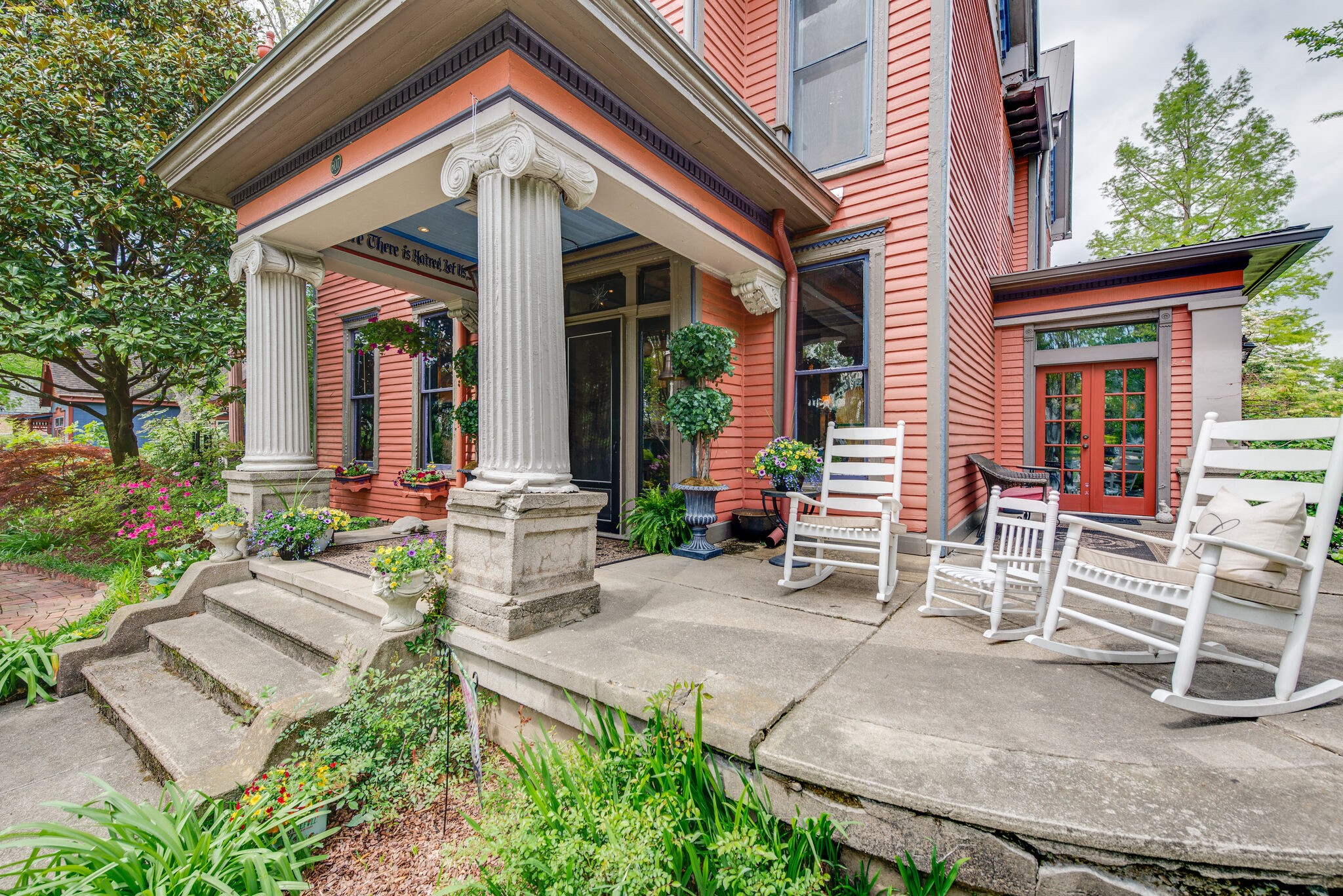607 5th Avenue West Springfield, TN 37172 - Photo 6 of 50 a view of a patio with table and chairs and potted plants