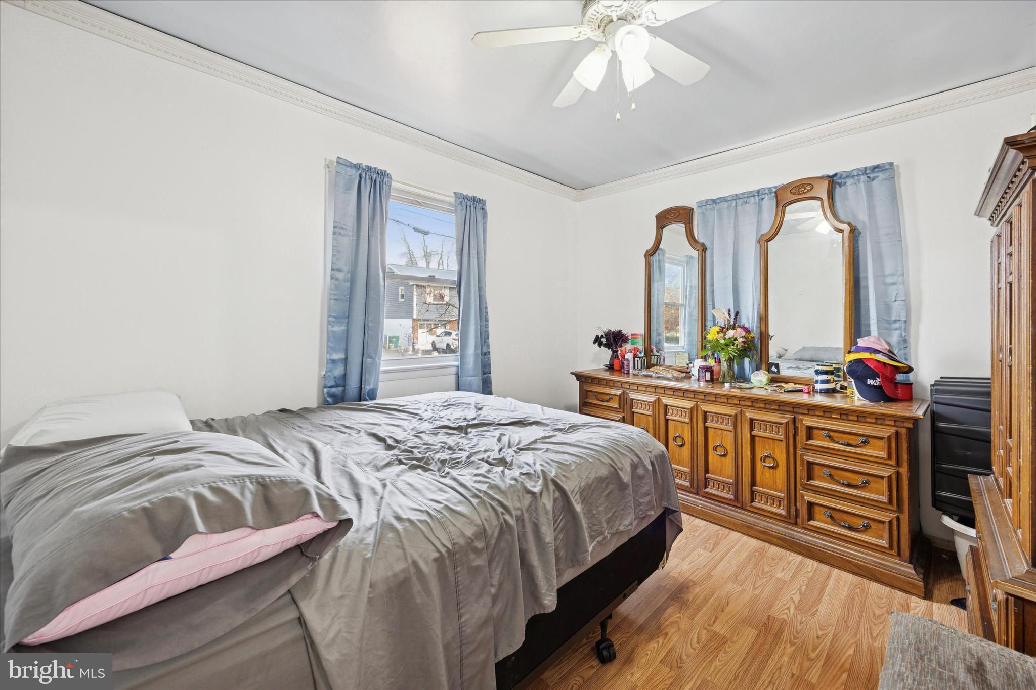 820 Keystone Street Croydon, PA 19021 - Photo 10 of 15 a bedroom with a bed and a large window