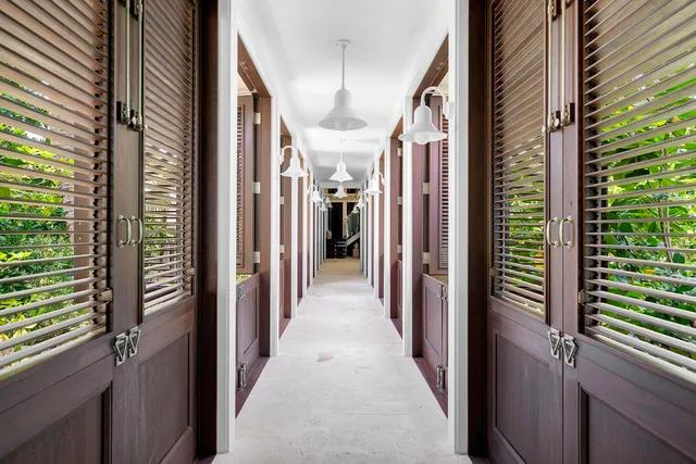 an aerial view of a houses with a yard