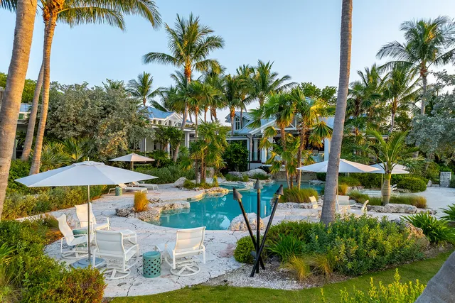 a view of a lake with boats and trees