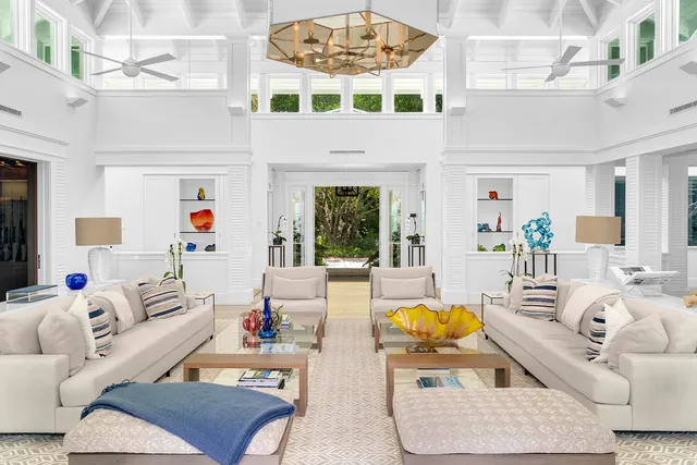 a view of an entryway with wooden floor and windows