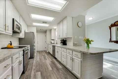 $525,000 | 50 Tournament Way, Unit I52, The Hills, TX 78738