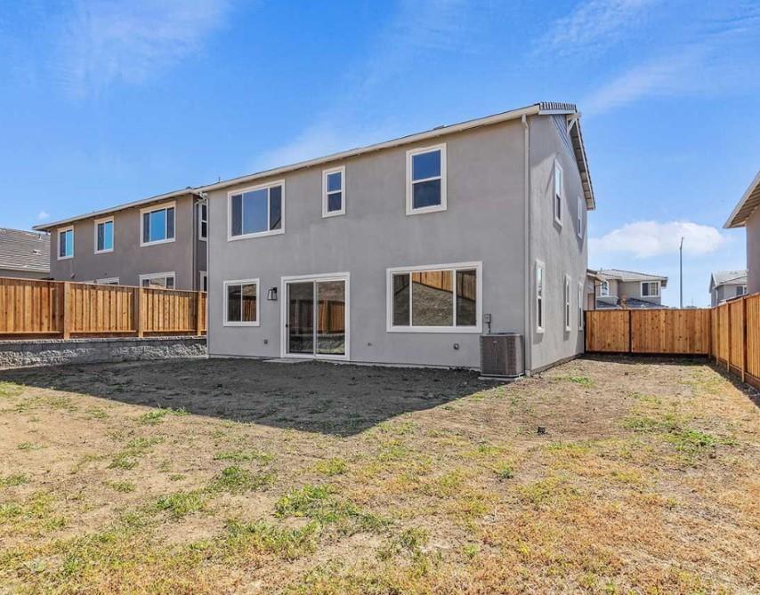 8094 Waterfall Lane Vallejo, CA 94591 - Photo 11 of 13 a front view of a house with a snow in front of it