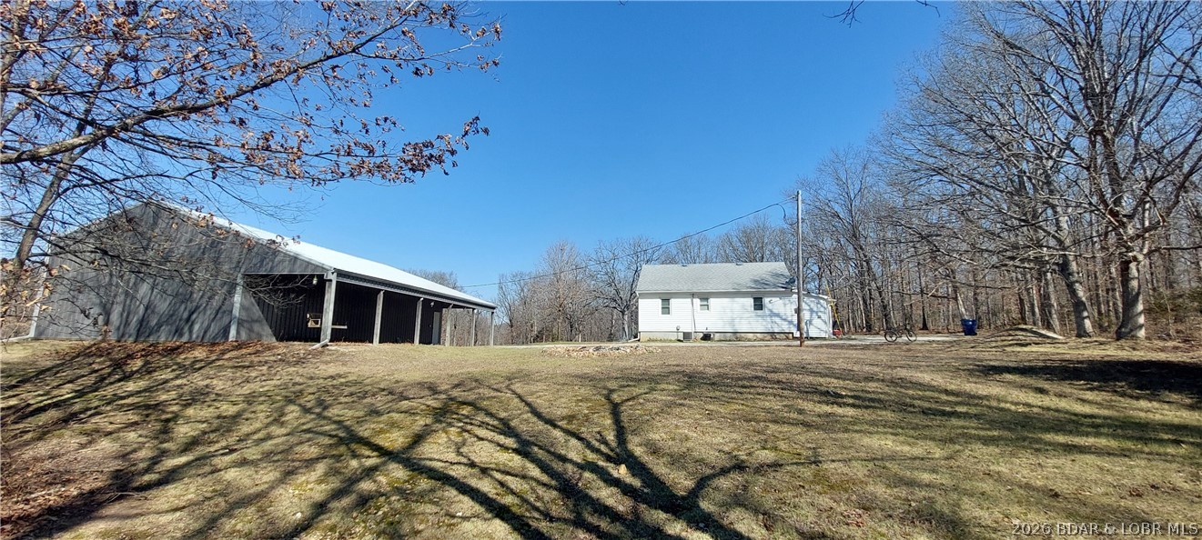 15563 Peach Tree Road Stover, MO 65078 - Photo 31 of 69 View of shop and home from the east.