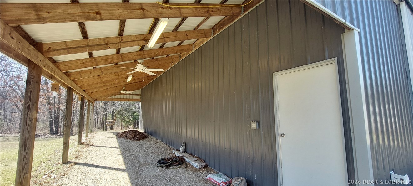 15563 Peach Tree Road Stover, MO 65078 - Photo 32 of 69 covered area for enjoying the outdoors or storing