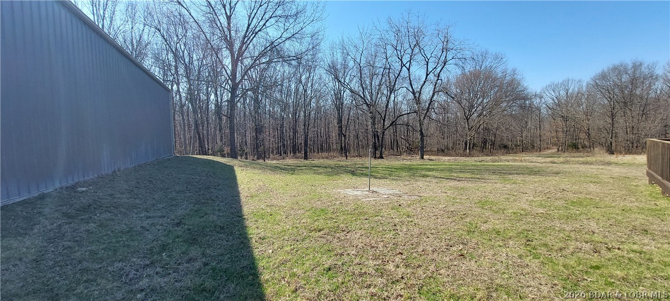 15563 Peach Tree Road Stover, MO 65078 - Photo 41 of 69 water hose hydrant between shop and ADU