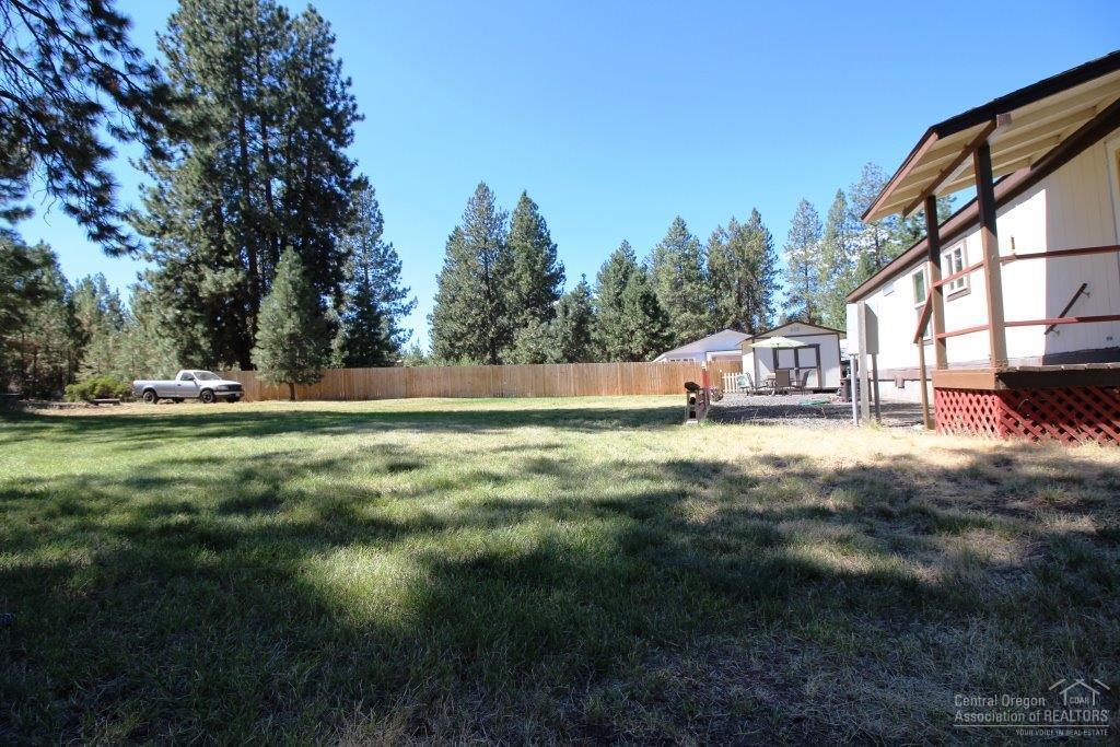 19235 Kiowa Road Bend, OR 97702 - Photo 25 of 25 a view of outdoor space with garden and trees