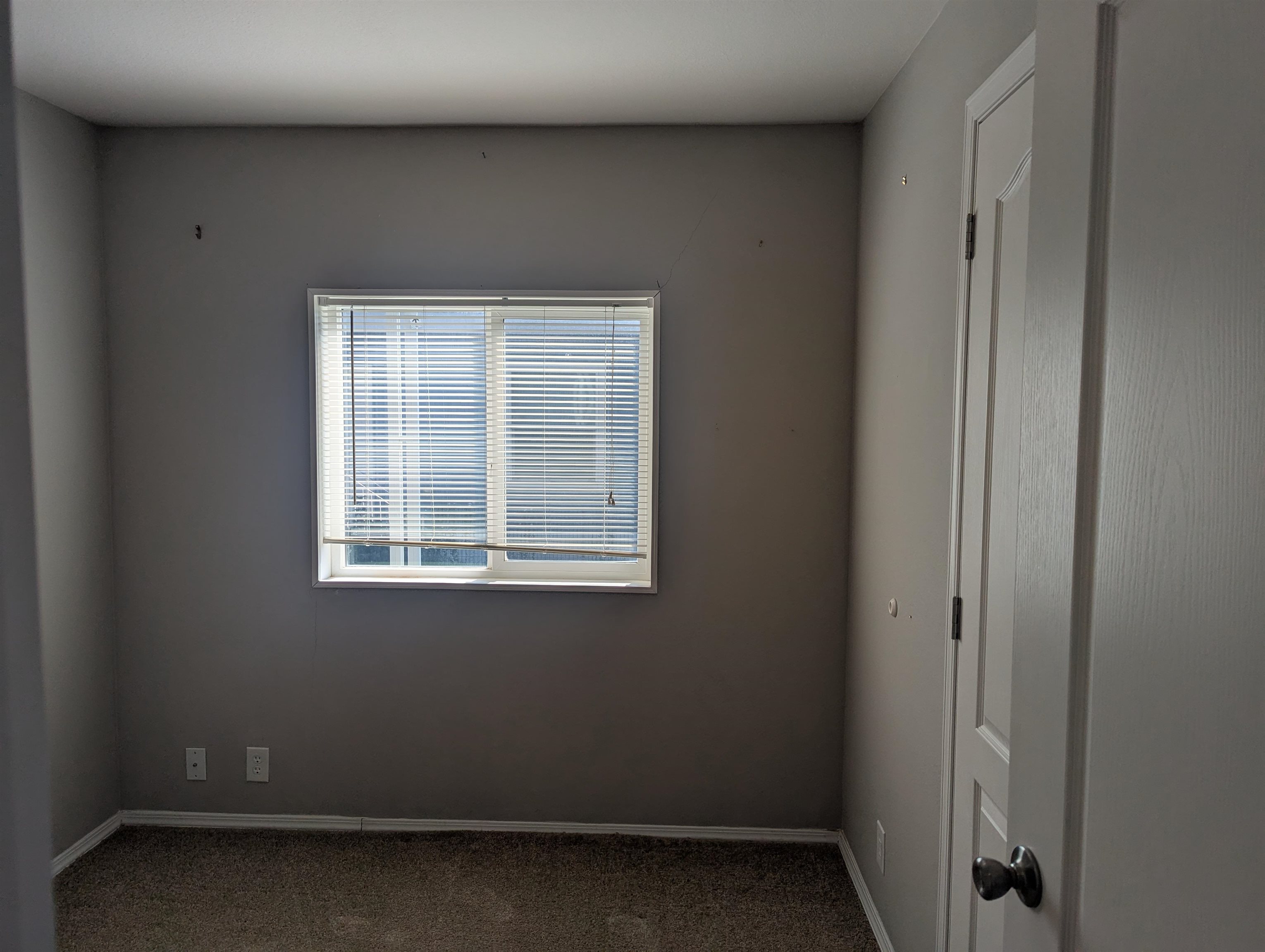 435 32 Road, Unit 53 Clifton, CO 81520 - Photo 13 of 24 a view of an empty room with a window