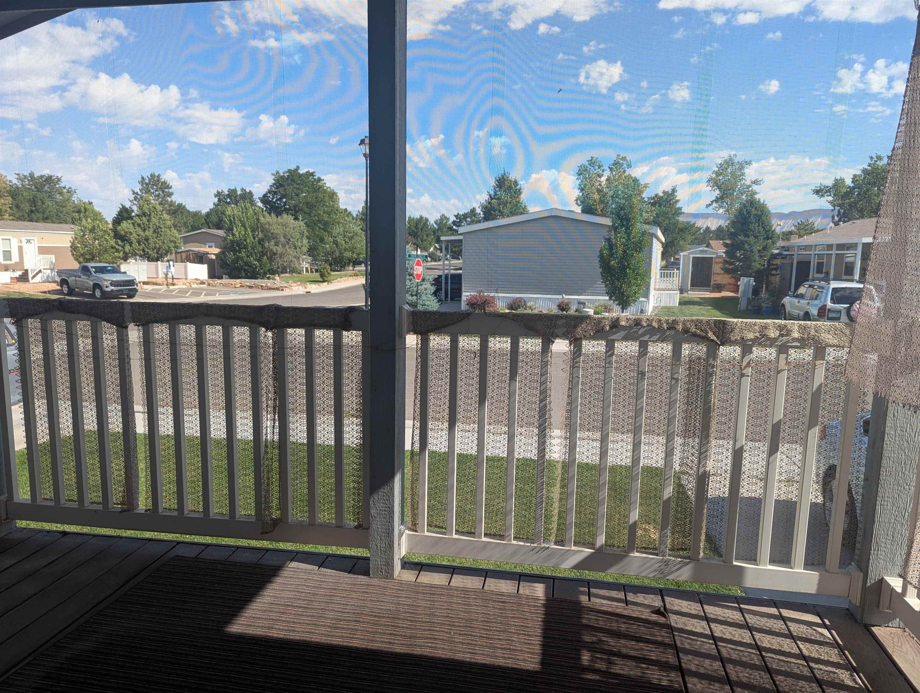 435 32 Road, Unit 53 Clifton, CO 81520 - Photo 3 of 24 a view of a balcony with a floor to ceiling window