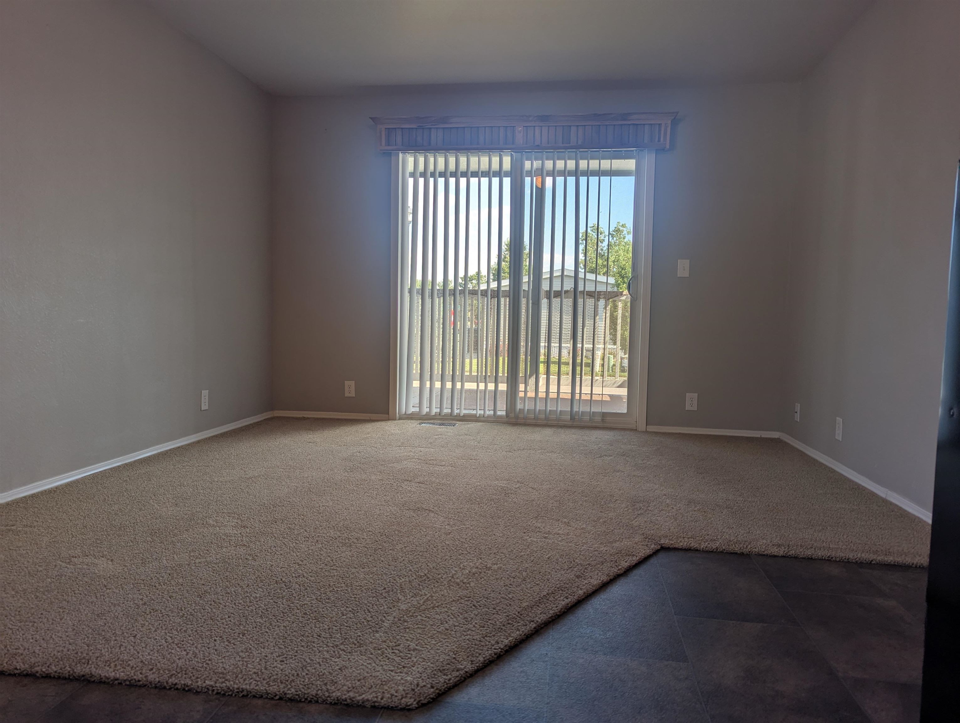 435 32 Road, Unit 53 Clifton, CO 81520 - Photo 4 of 24 an empty room with a window