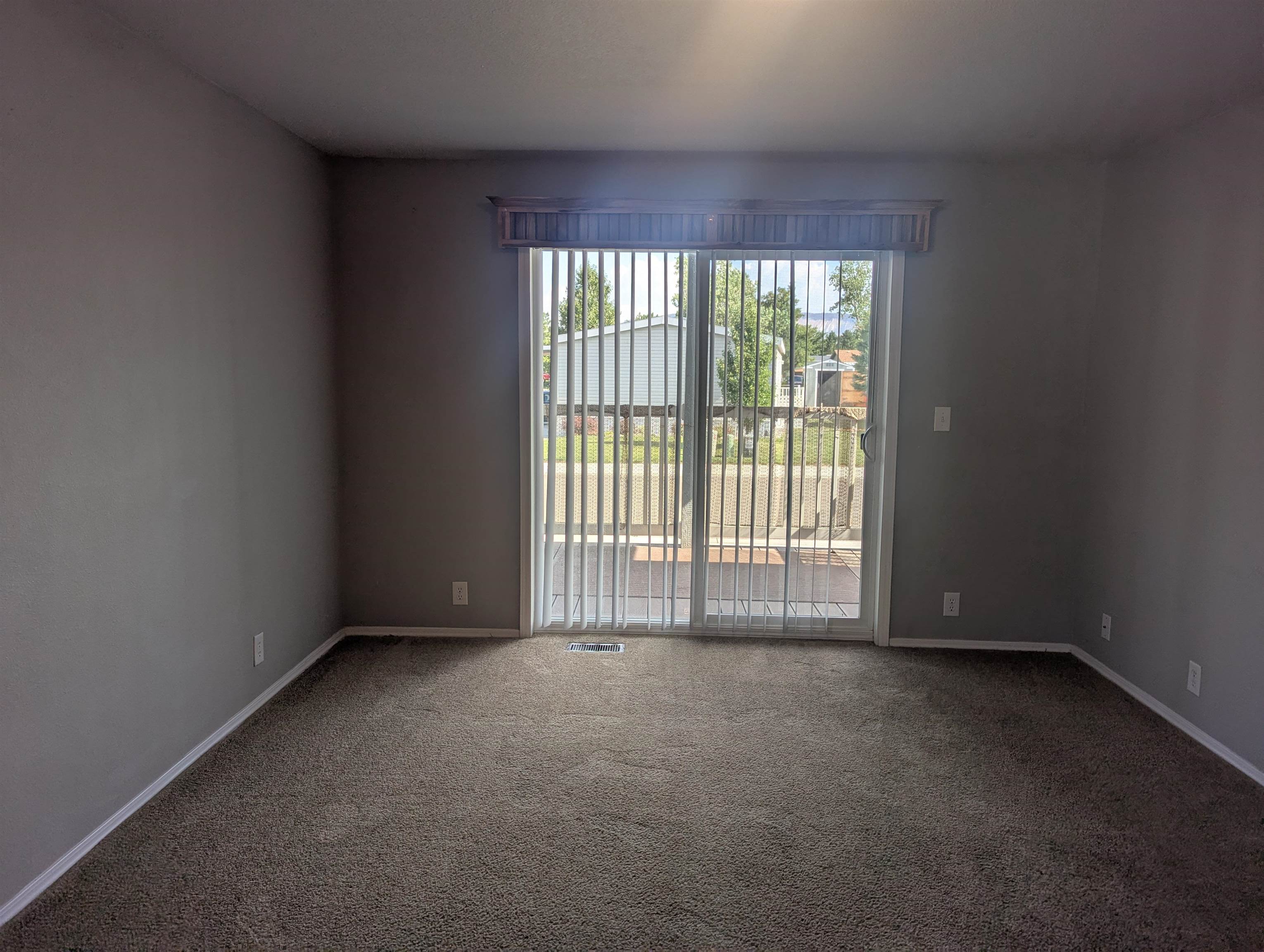 435 32 Road, Unit 53 Clifton, CO 81520 - Photo 6 of 24 a view of an empty room with a window