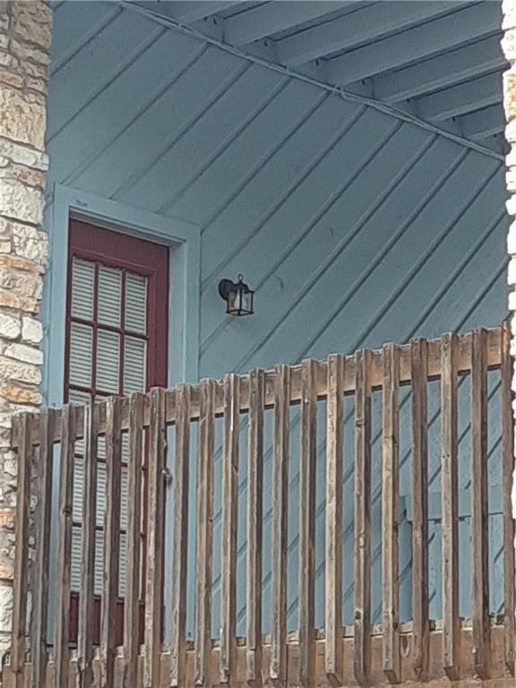 2408 Longview Street, Unit 212 Austin, TX 78705 - Photo 3 of 15 a view of a backyard with wooden fence
