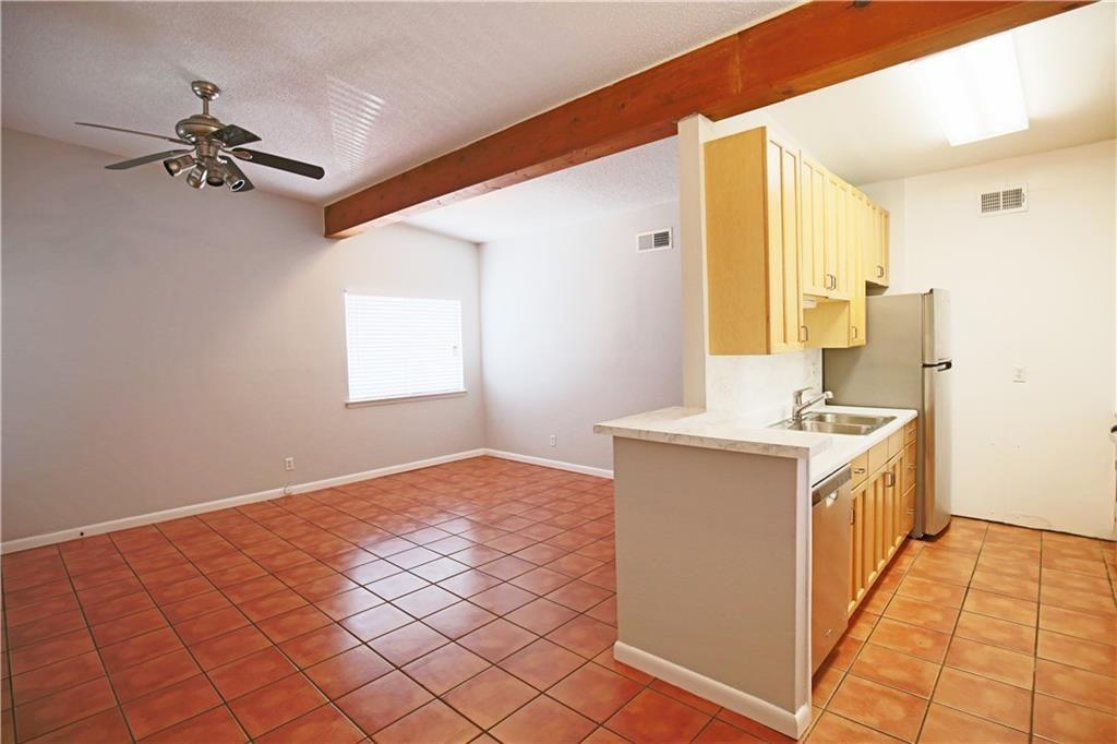 2408 Longview Street, Unit 212 Austin, TX 78705 - Photo 4 of 15 a bathroom with a sink vanity and a mirror
