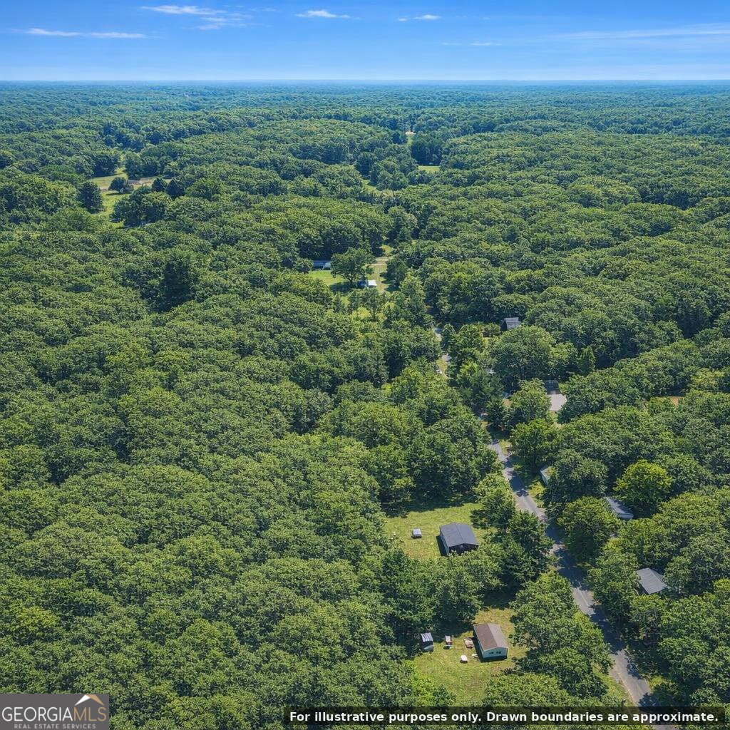 0 Harry Arnold Road Monroe, GA 30655 - Photo 3 of 13 an aerial view of residential houses with outdoor space and trees