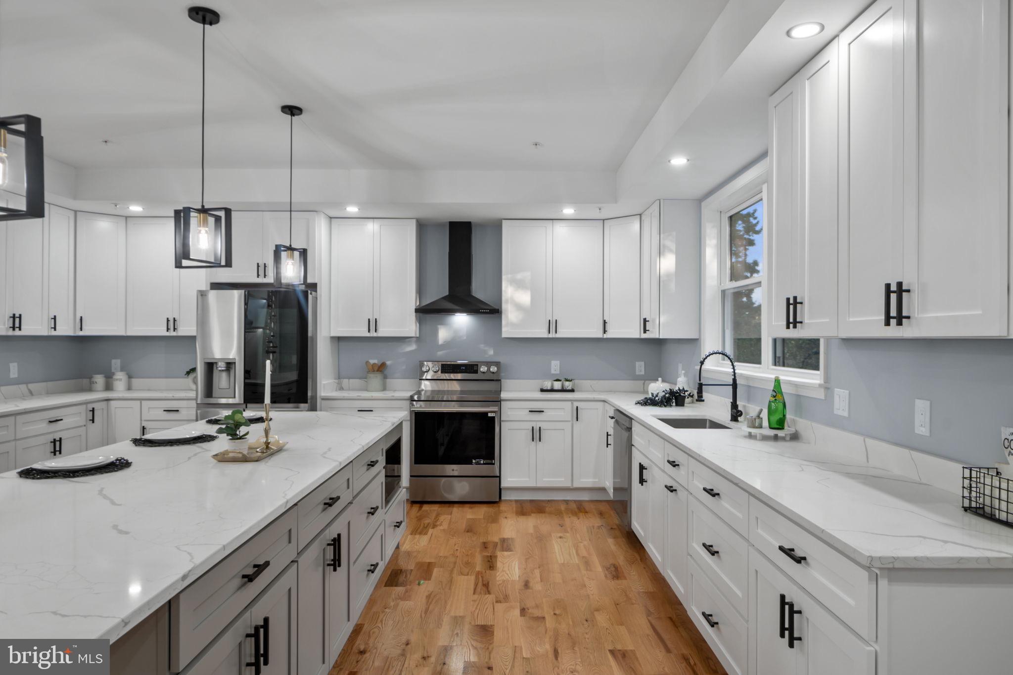 1611 Dayton Road Hyattsville, MD 20783 - Photo 14 of 54 Modern kitchen with sleek design and elegance.