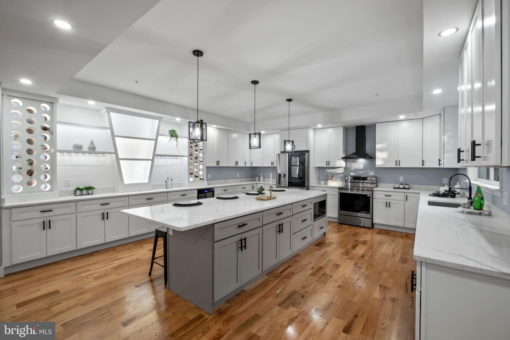 1611 Dayton Road Hyattsville, MD 20783 - Photo 17 of 54 Sleek modern kitchen with elegant finishes.