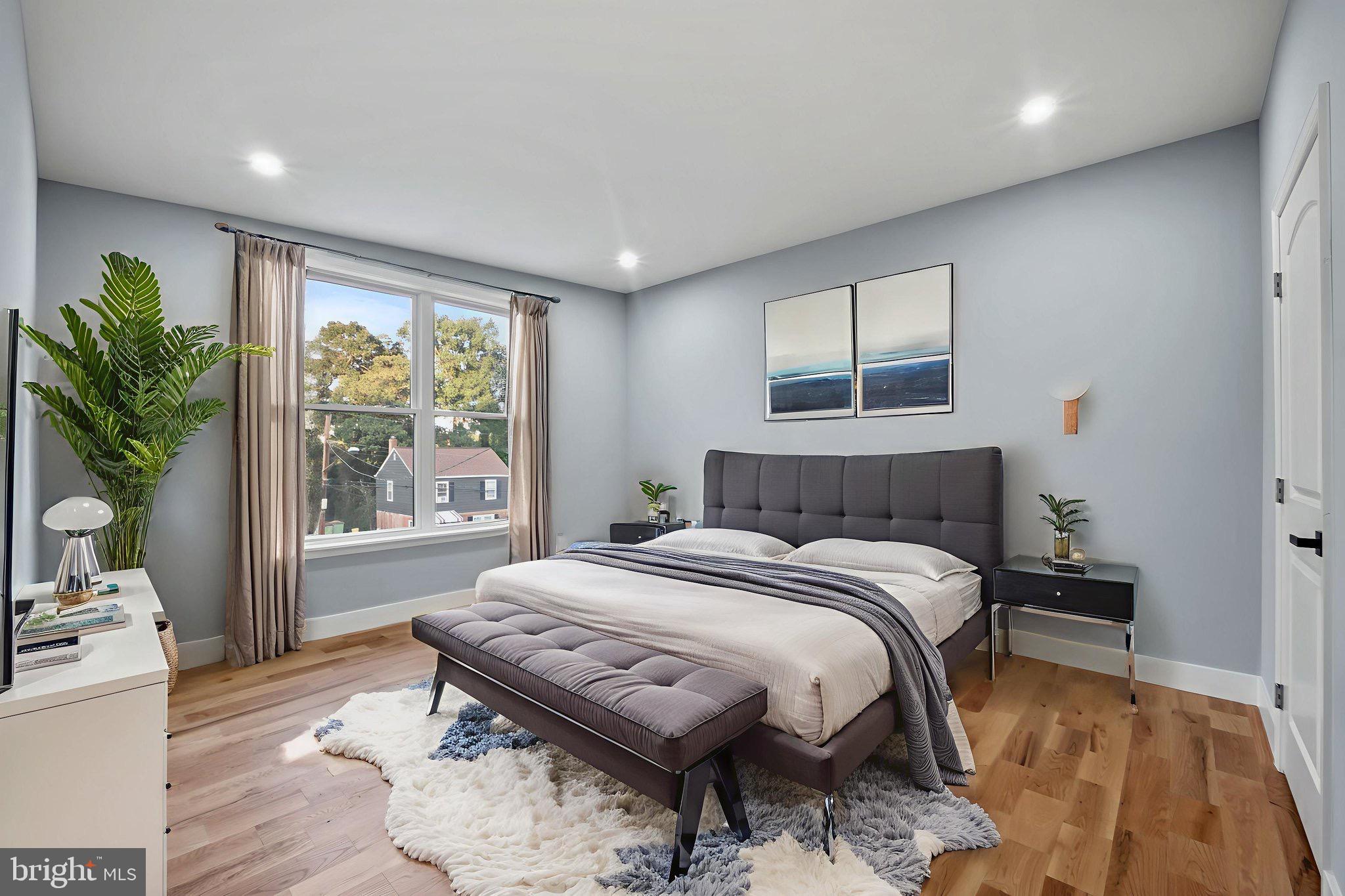 1611 Dayton Road Hyattsville, MD 20783 - Photo 23 of 54 Serene bedroom with natural light and style.