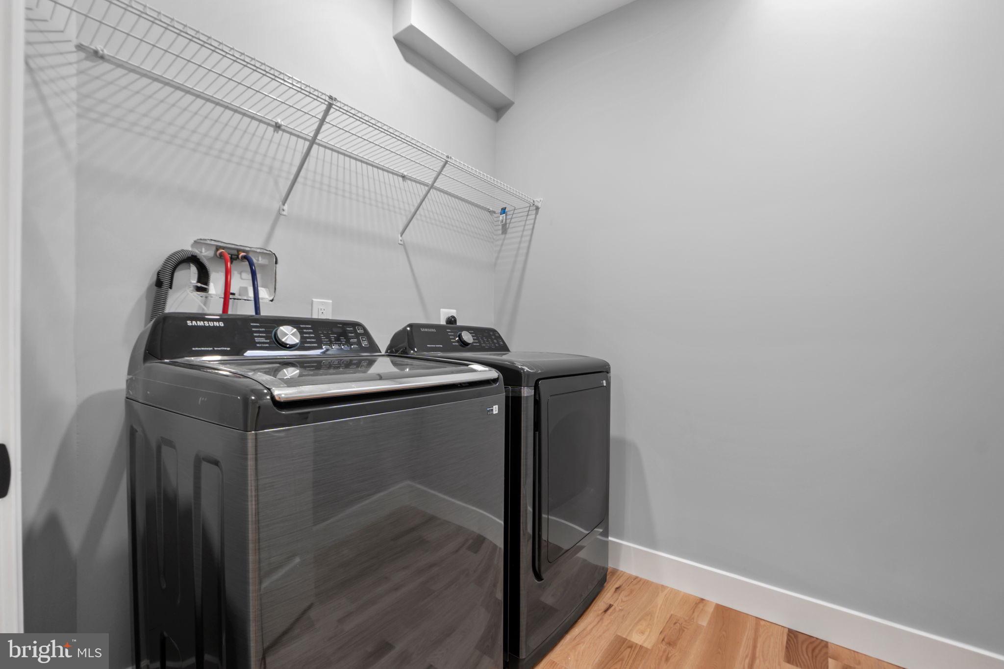 1611 Dayton Road Hyattsville, MD 20783 - Photo 27 of 54 Sleek laundry space with modern appliances.