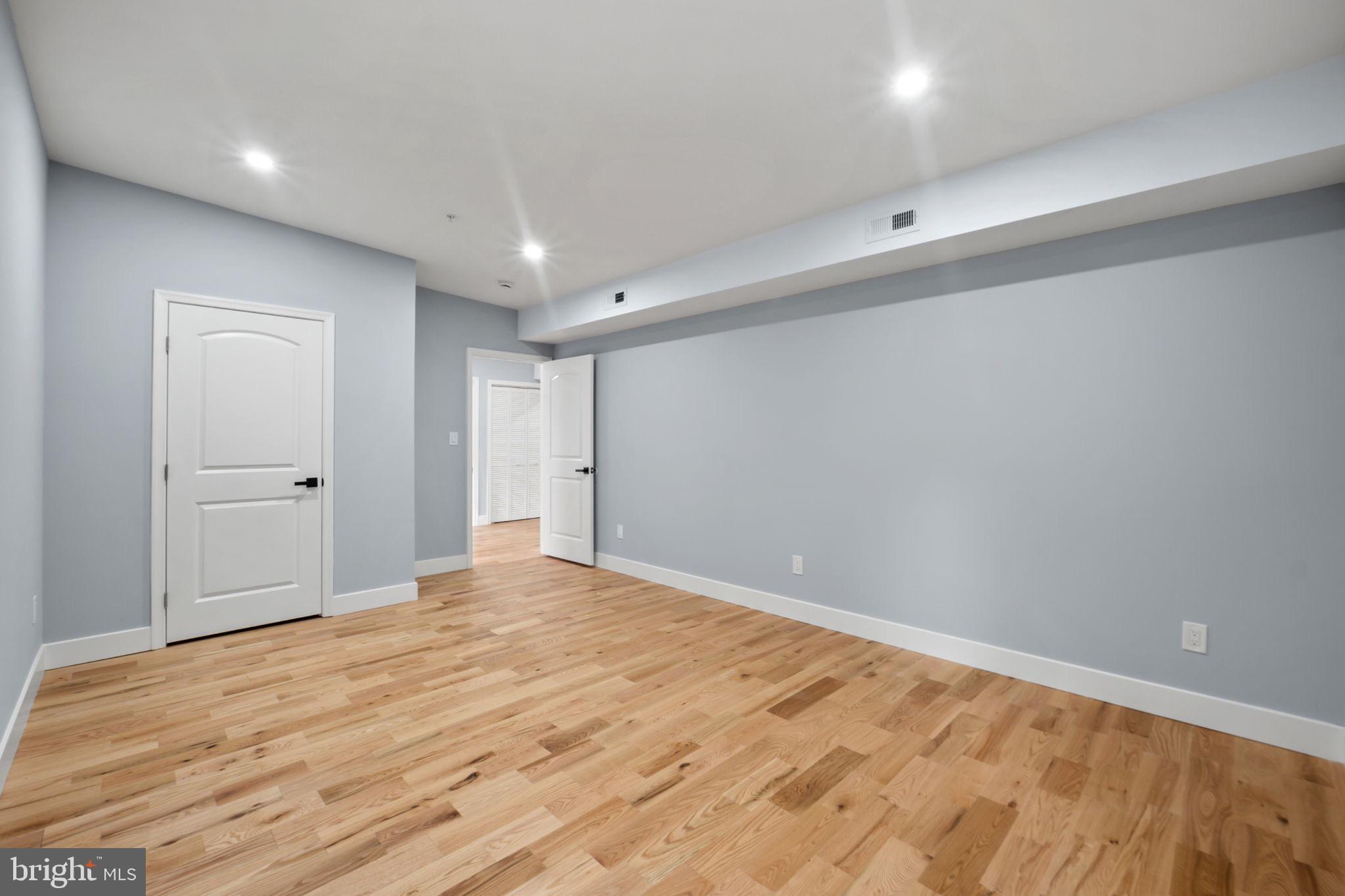1611 Dayton Road Hyattsville, MD 20783 - Photo 32 of 54 Spacious room with modern design elements.