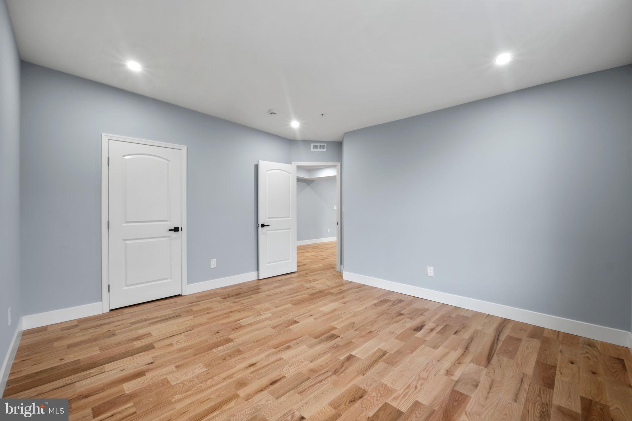 1611 Dayton Road Hyattsville, MD 20783 - Photo 35 of 54 Spacious room with soft blue walls.