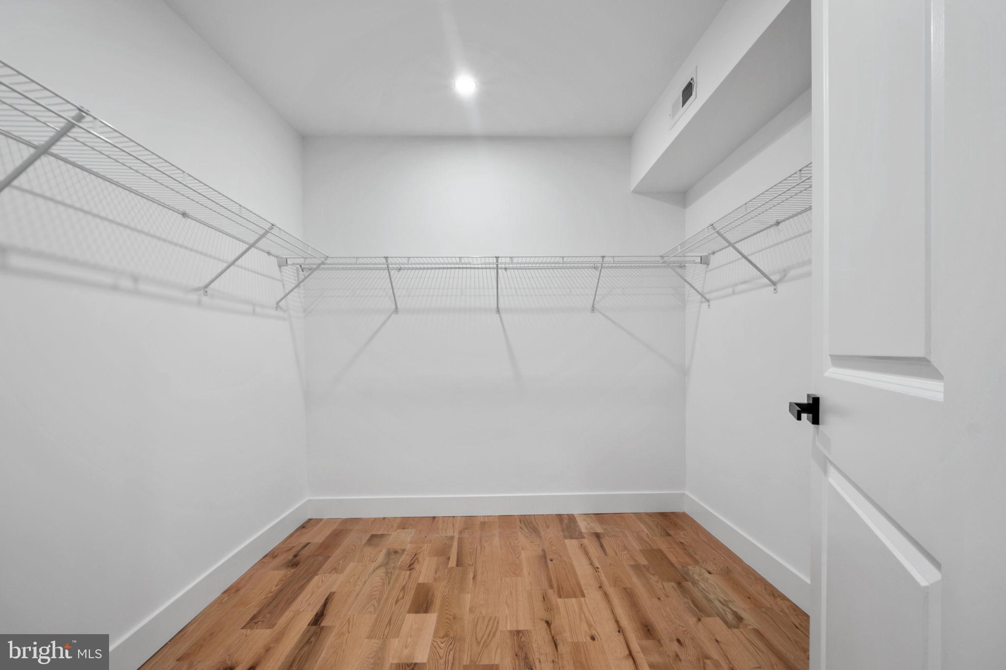 1611 Dayton Road Hyattsville, MD 20783 - Photo 36 of 54 Spacious closet with sleek design.
