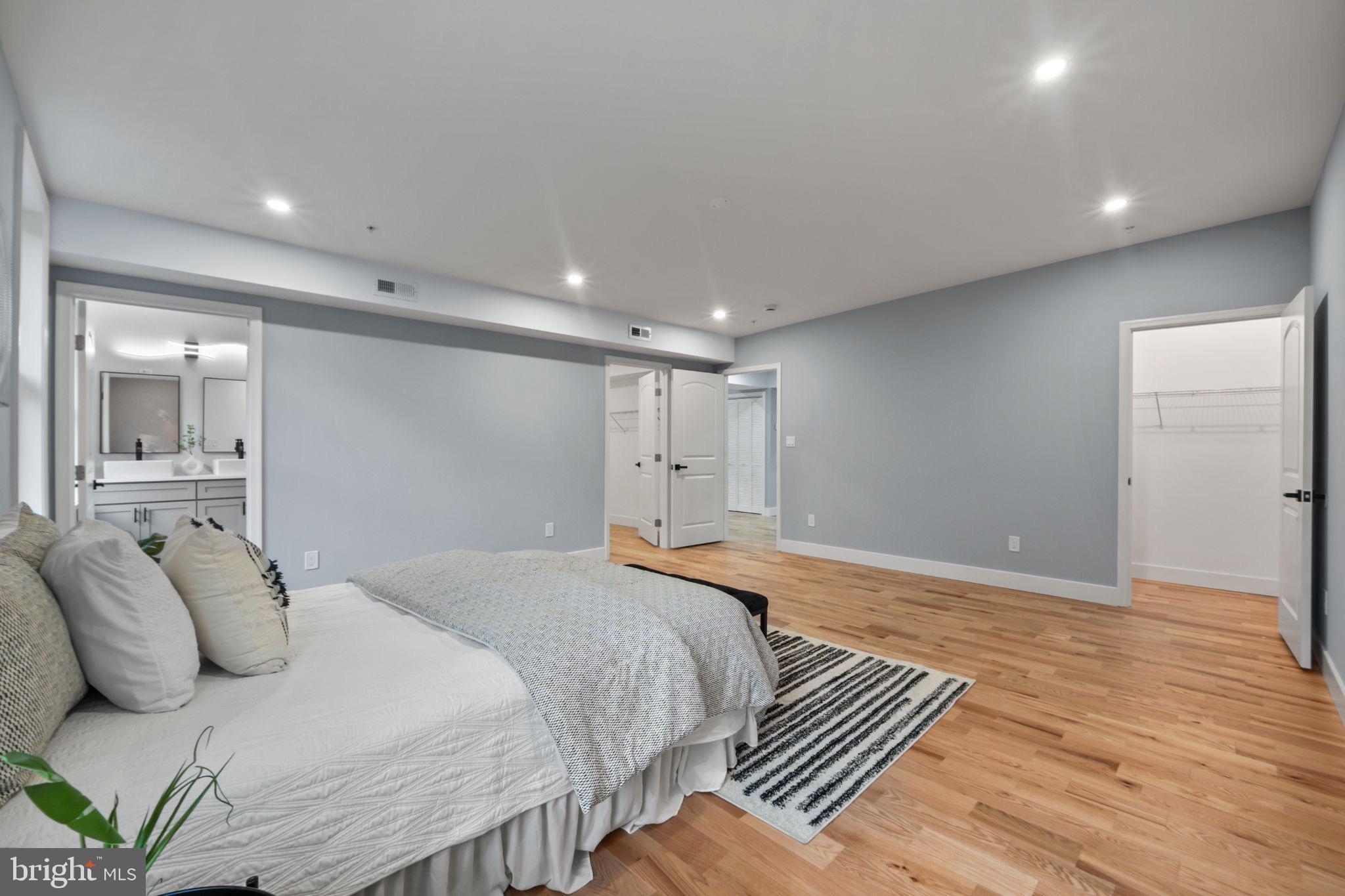 1611 Dayton Road Hyattsville, MD 20783 - Photo 40 of 54 Spacious, serene bedroom with modern elegance.