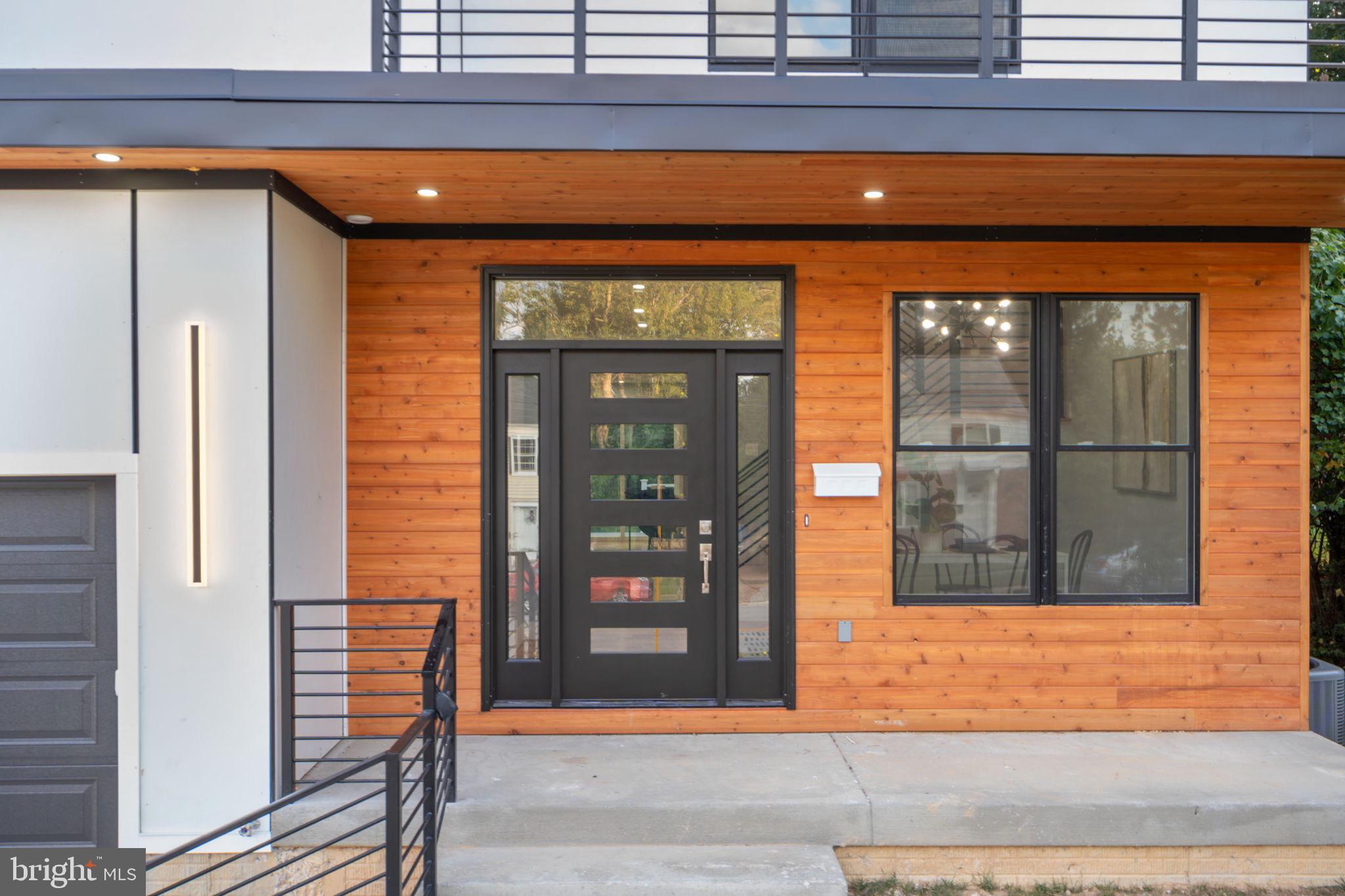 1611 Dayton Road Hyattsville, MD 20783 - Photo 5 of 54 Modern entrance with sleek wood accents.