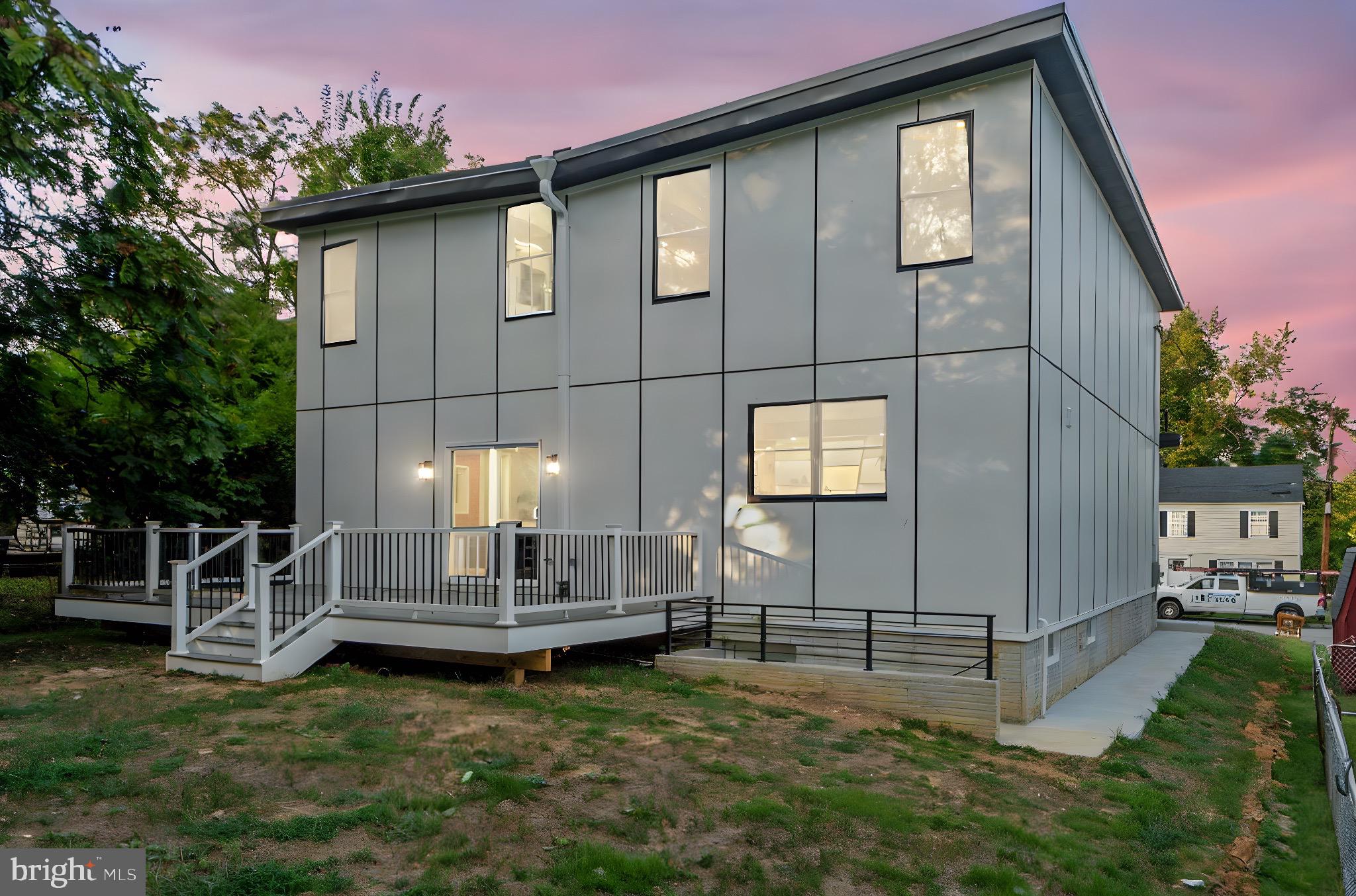 1611 Dayton Road Hyattsville, MD 20783 - Photo 51 of 54 Modern home with sleek design at dusk.