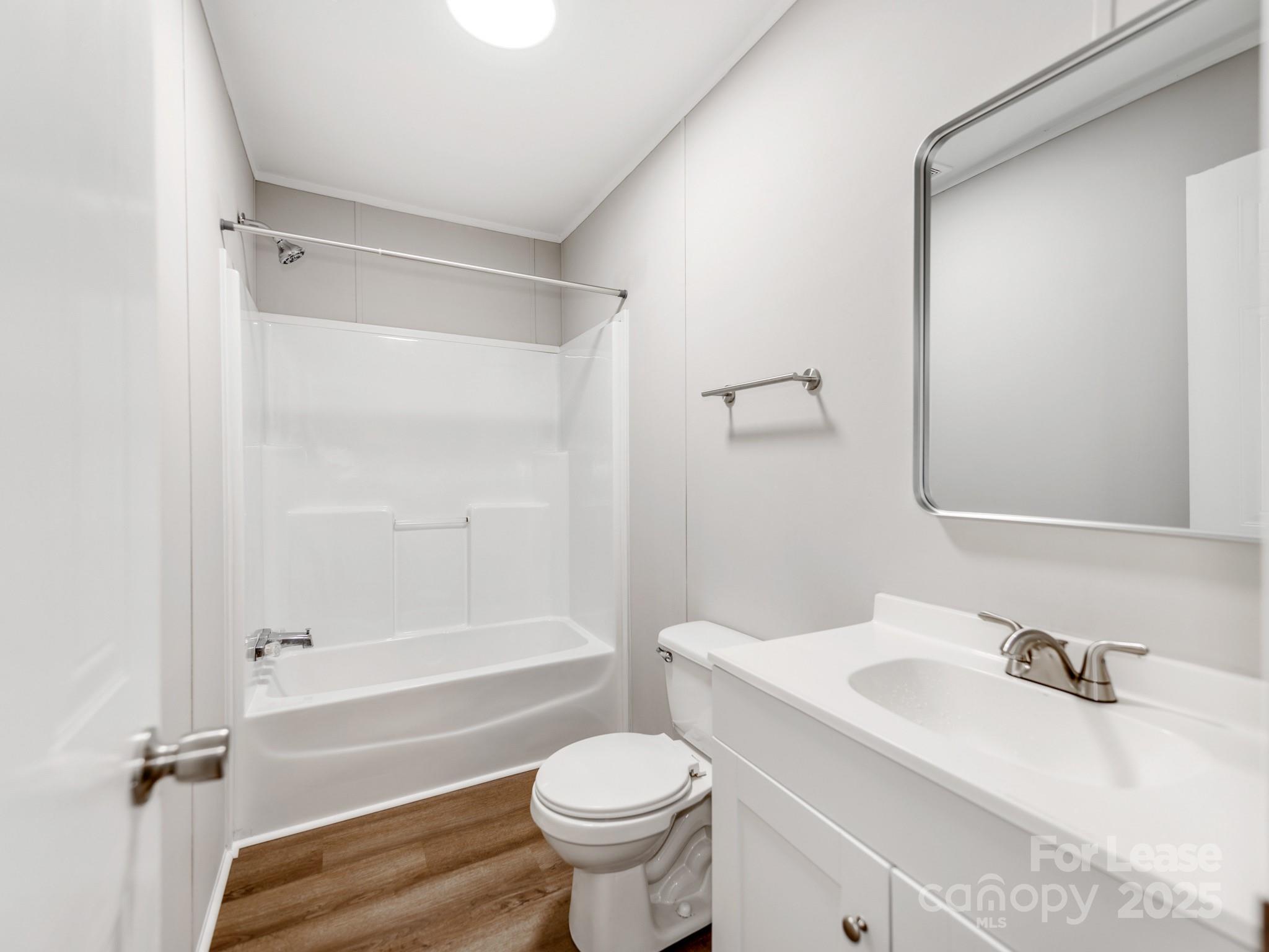 1219 Foxlaire Drive Denver, NC 28037 - Photo 19 of 30 a bathroom with a sink toilet and shower