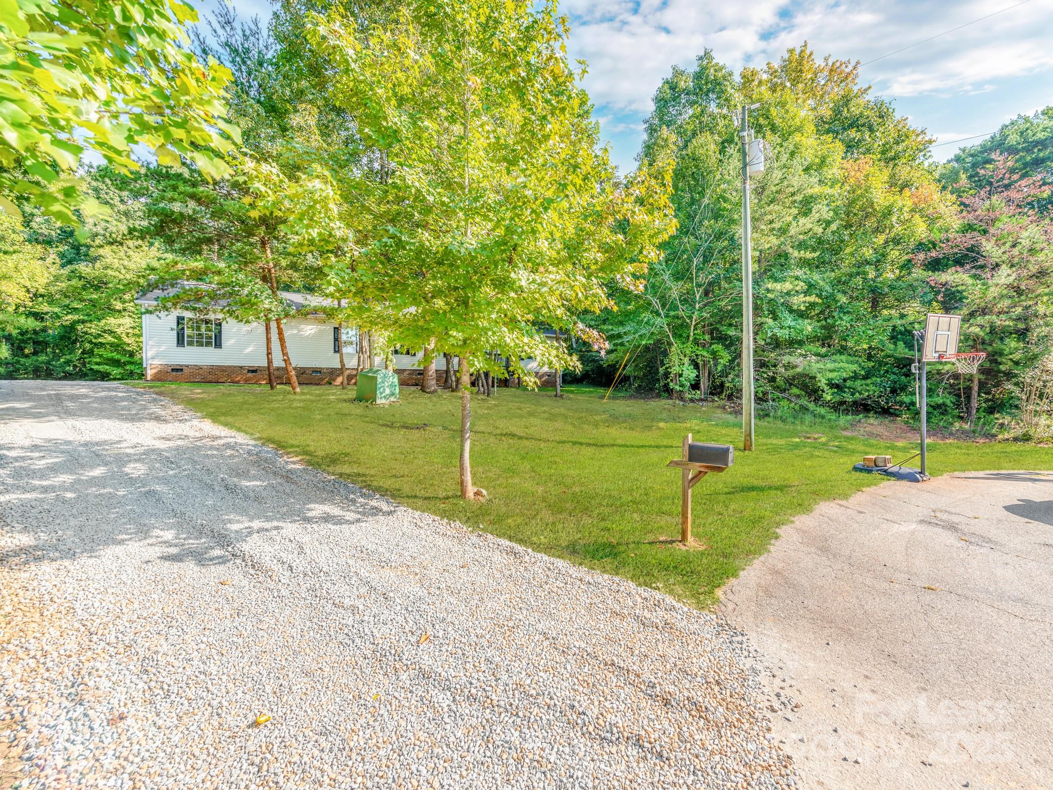 1219 Foxlaire Drive Denver, NC 28037 - Photo 2 of 30 a view of a park with tree s