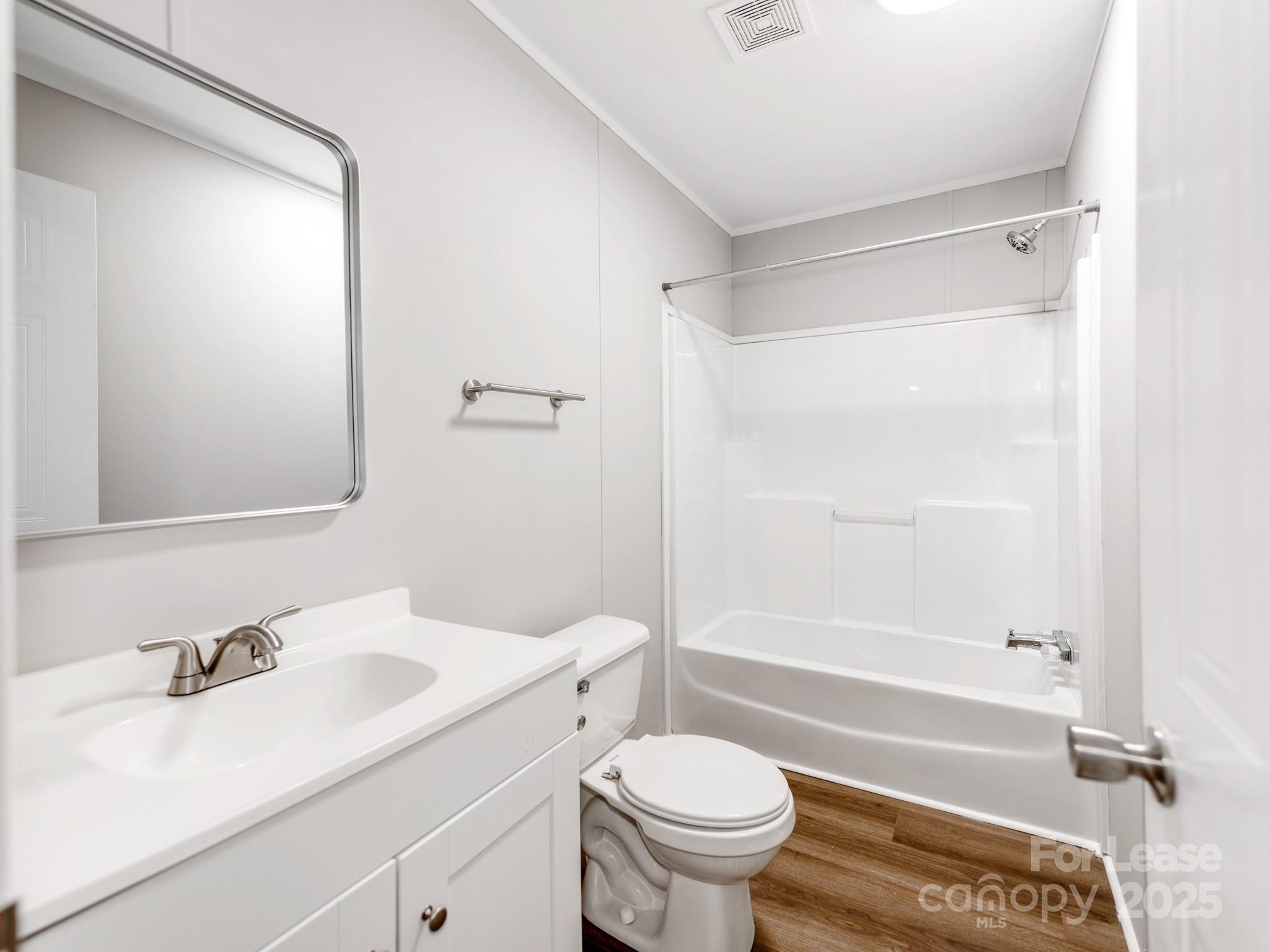 1219 Foxlaire Drive Denver, NC 28037 - Photo 23 of 30 a bathroom with a sink toilet and shower