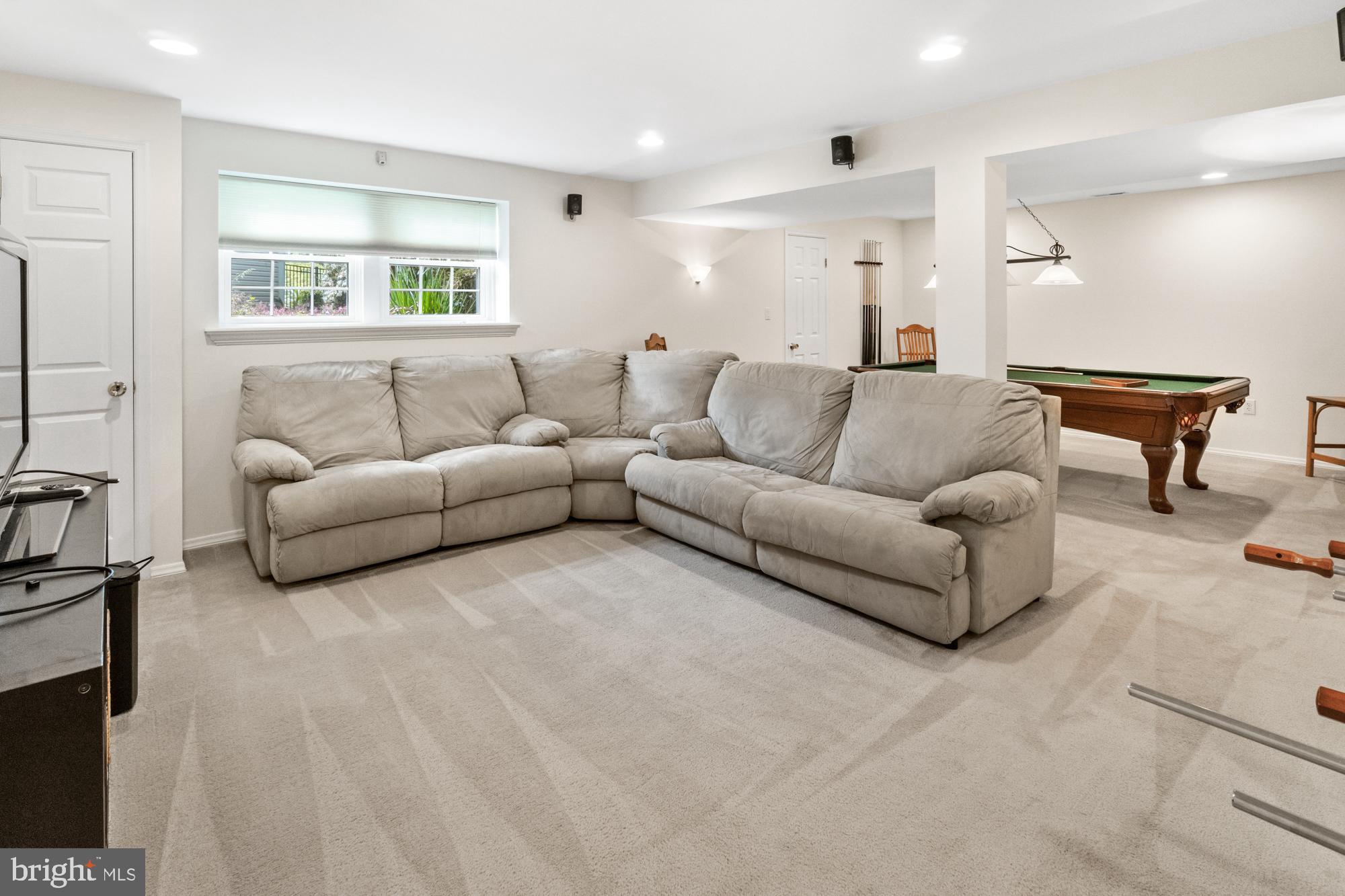17247 Spates Hill Road Poolesville, MD 20837 - Photo 56 of 90 Mega-finished rec room. Couch conveys!