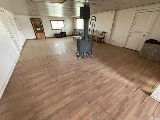 a view of a livingroom with furniture and a fireplace