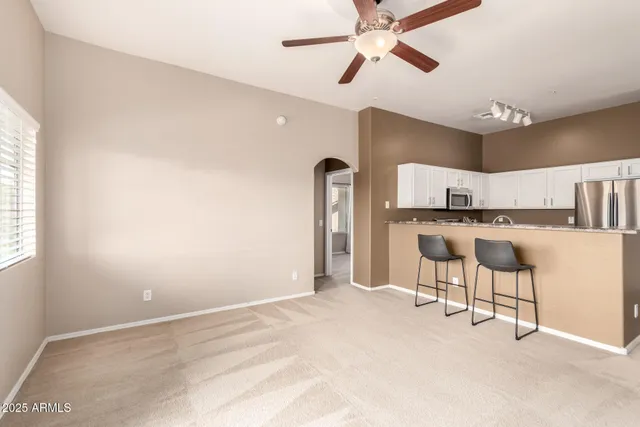 a view of empty room with a window