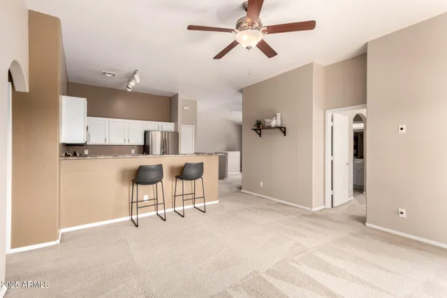 a view of kitchen with cabinets