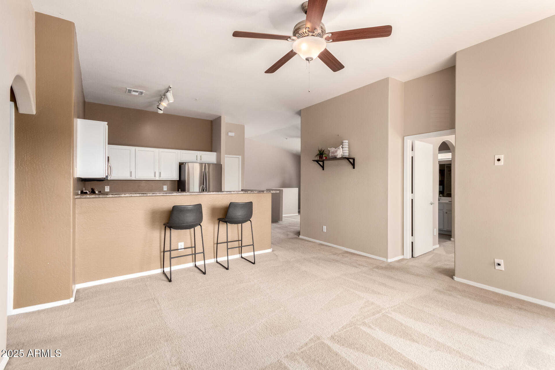 16620 South 48th Street, Unit 70 Phoenix, AZ 85048 - Photo 13 of 36 a view of kitchen with furniture and a ceiling fan