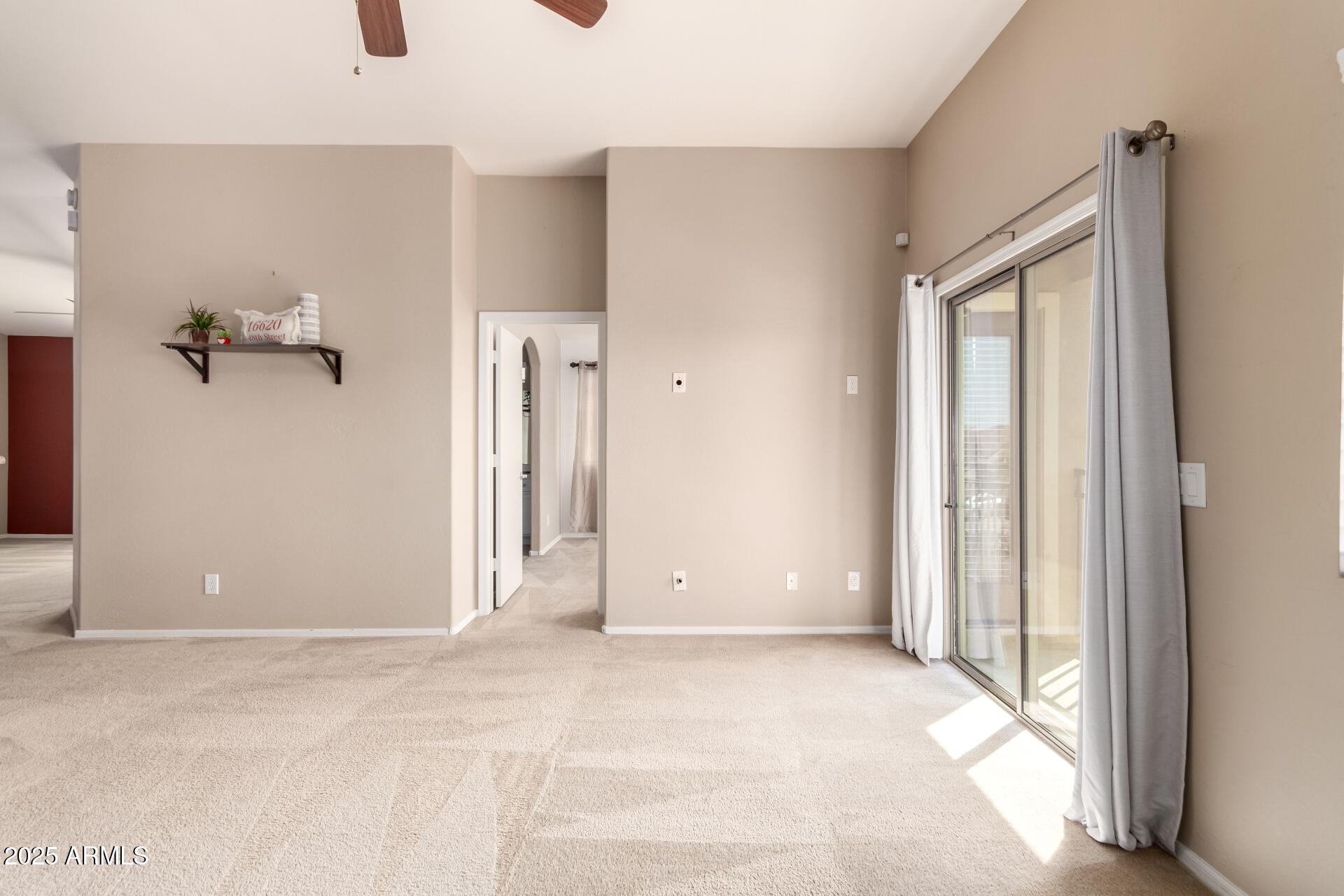 16620 South 48th Street, Unit 70 Phoenix, AZ 85048 - Photo 14 of 36 a view of a room with a wooden door