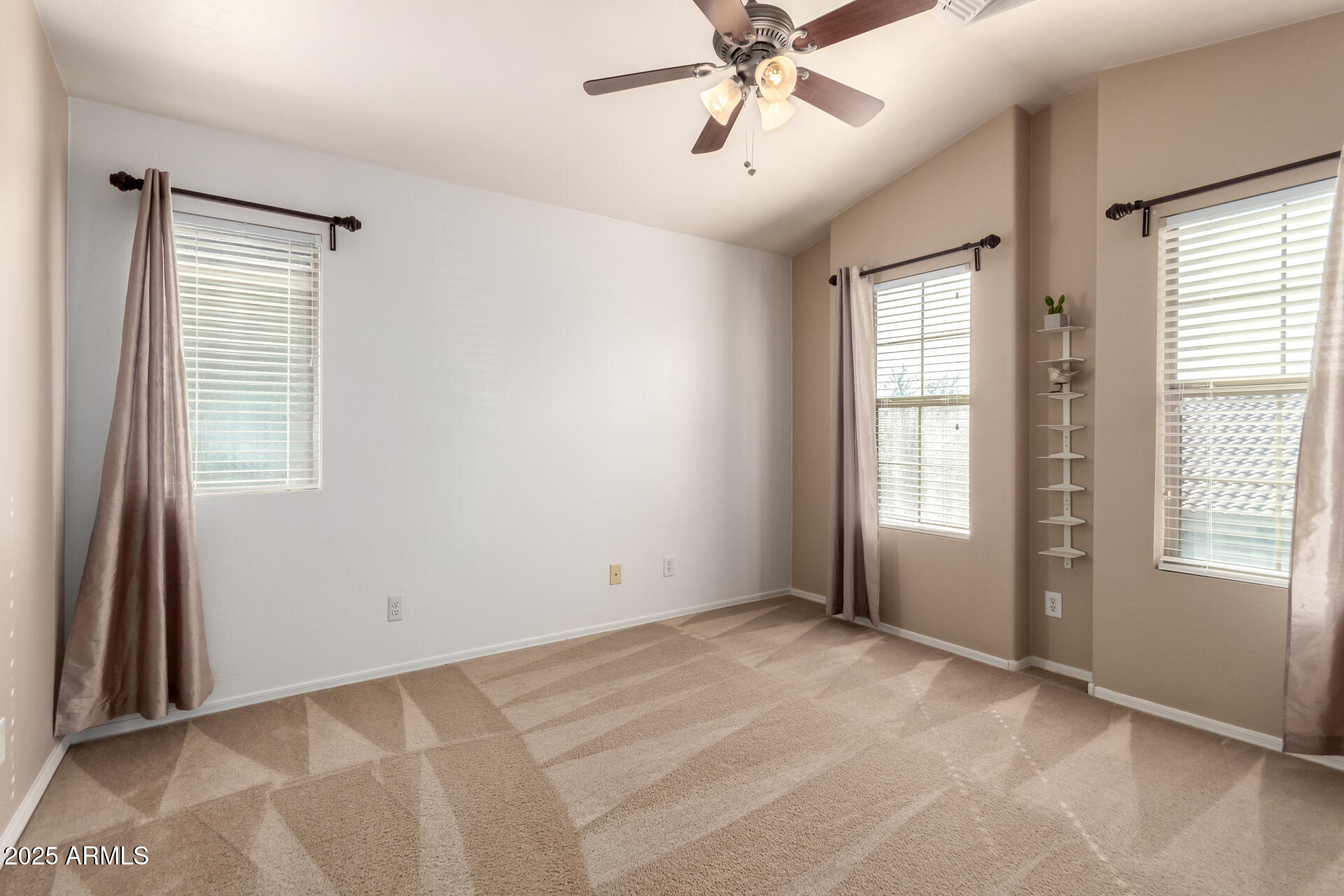 16620 South 48th Street, Unit 70 Phoenix, AZ 85048 - Photo 20 of 36 a view of an empty room with a window