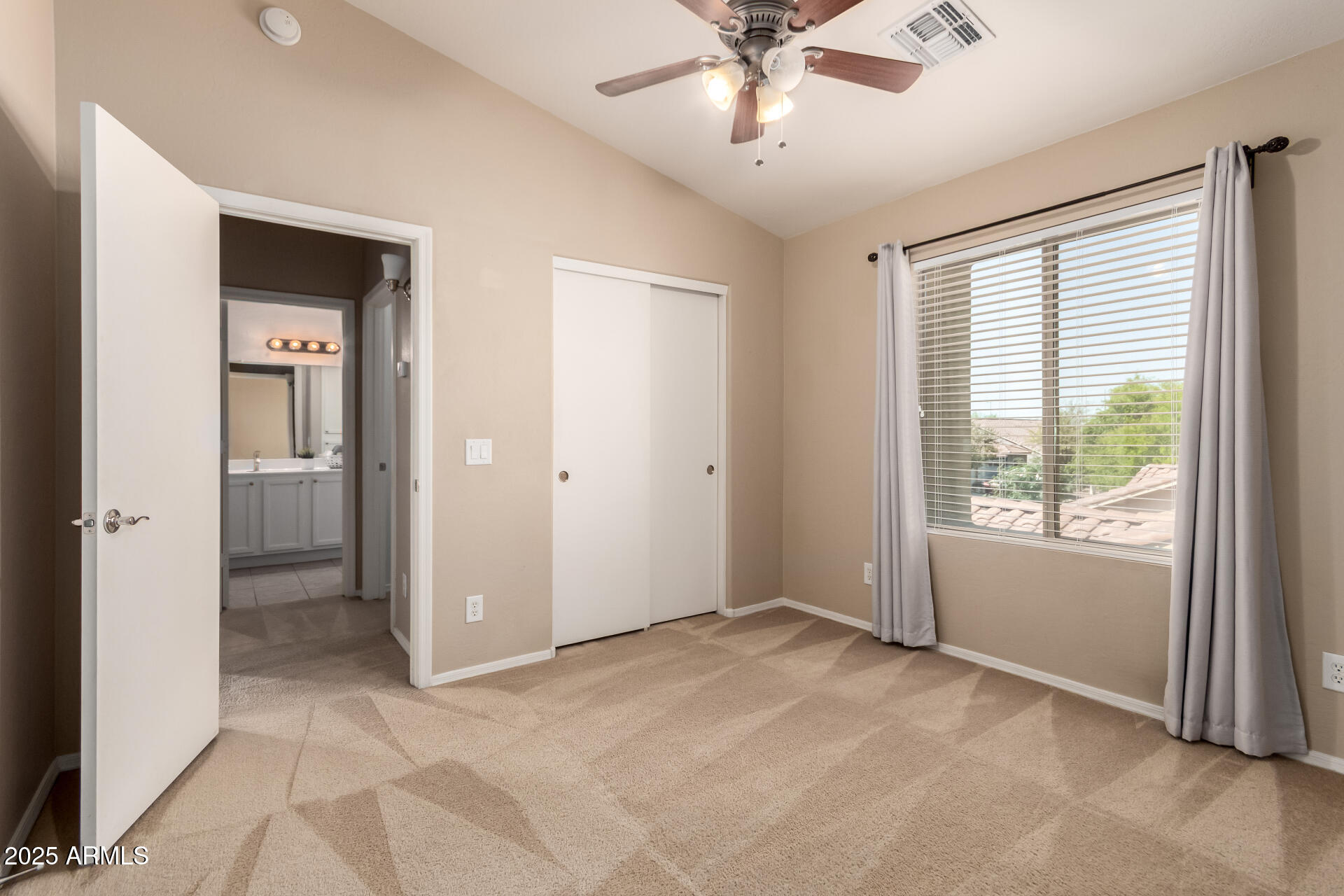 16620 South 48th Street, Unit 70 Phoenix, AZ 85048 - Photo 25 of 36 a view of an empty room with a window