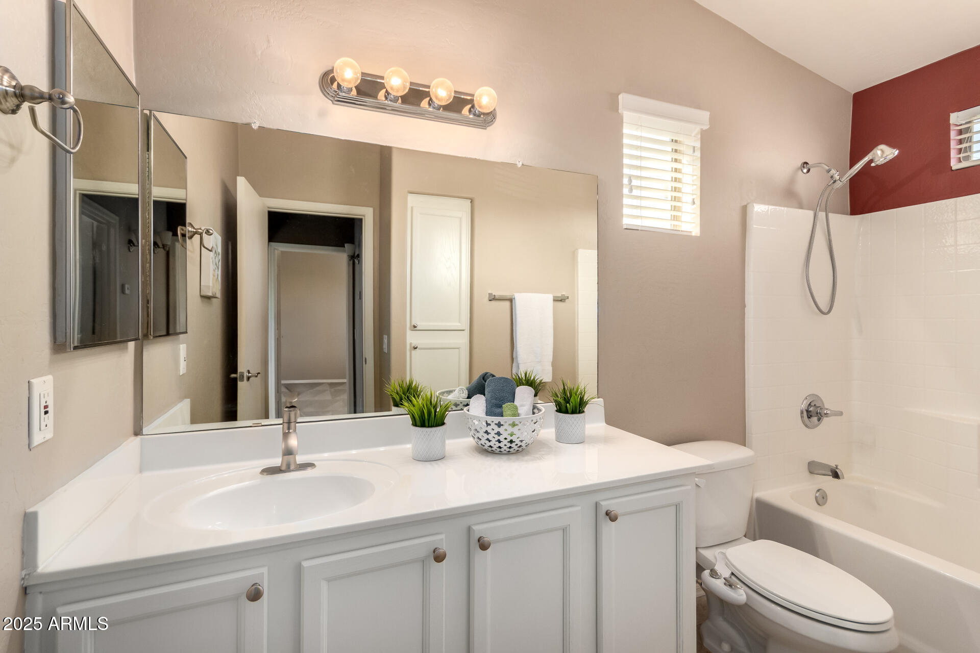 16620 South 48th Street, Unit 70 Phoenix, AZ 85048 - Photo 26 of 36 a bathroom with a granite countertop sink toilet and shower