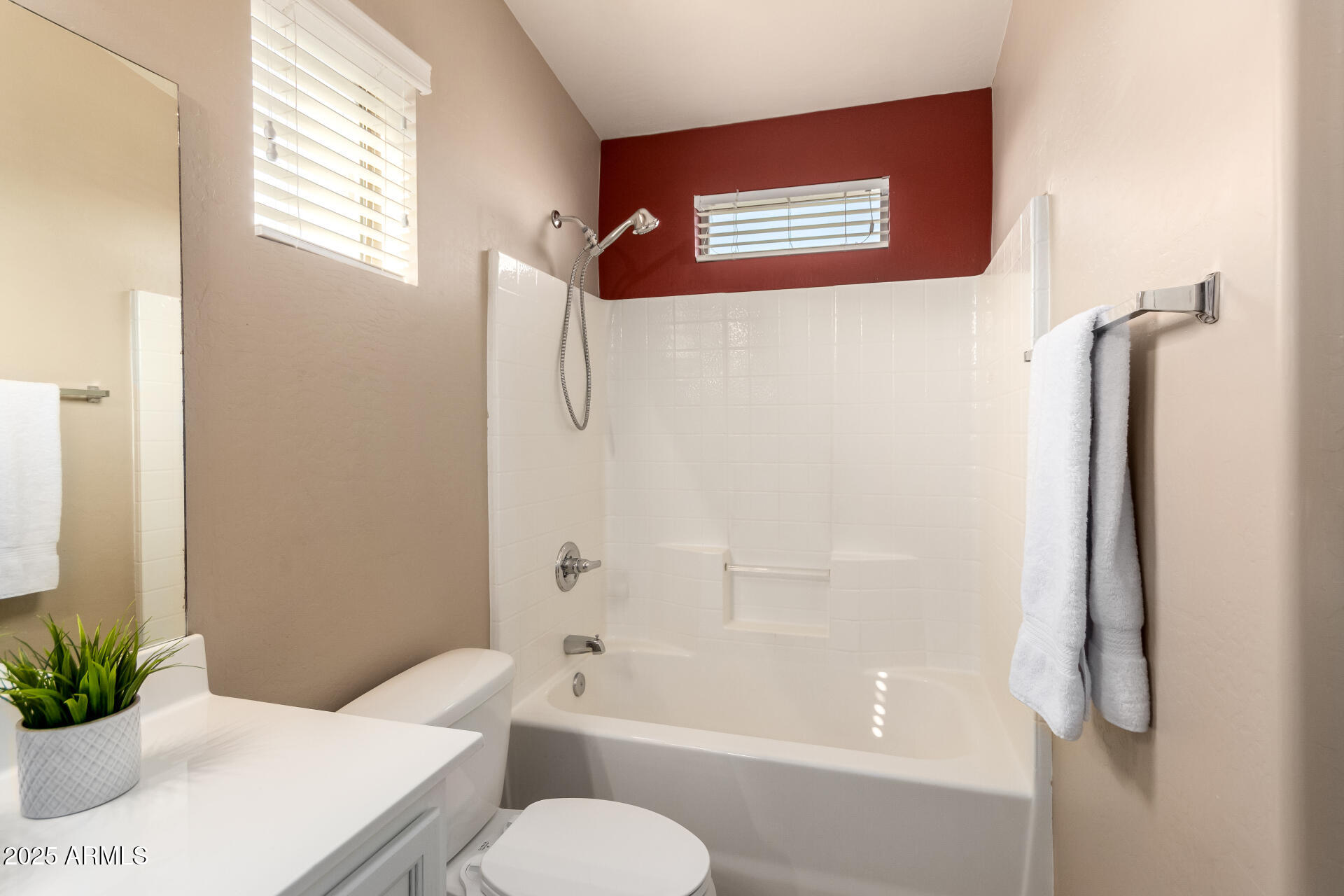 16620 South 48th Street, Unit 70 Phoenix, AZ 85048 - Photo 27 of 36 a bathroom with a sink toilet and shower